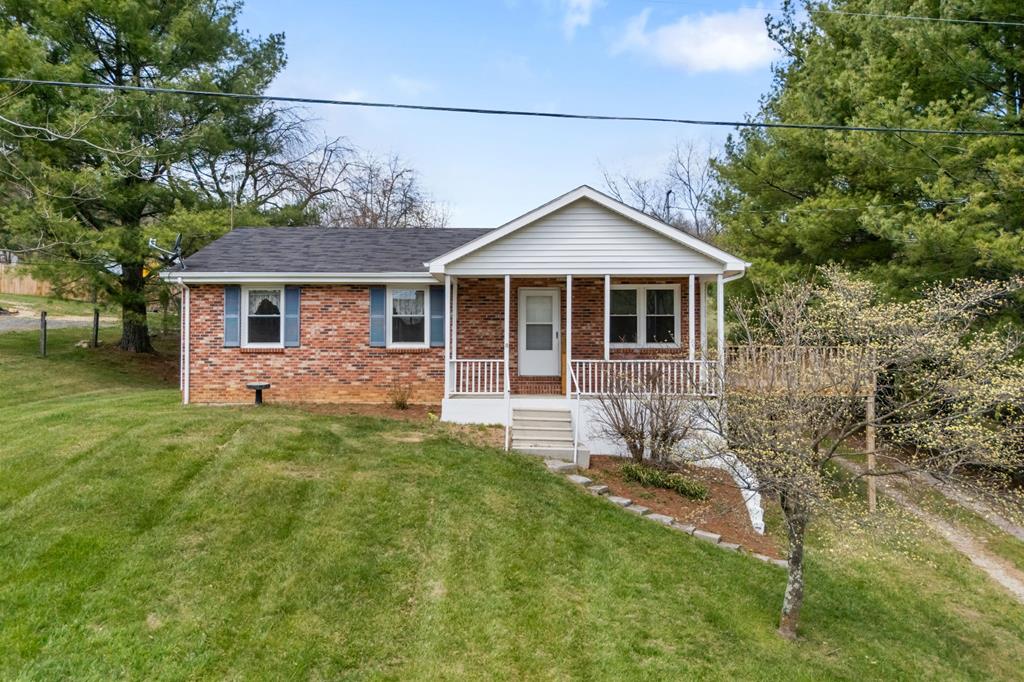 Welcome to 320 Saint Lukes Rd. Where location, potential, and classic charm are all offered in one package! In this dream setting, one of the county's most desirable areas, this property offers the perfect balance of peaceful living while being just minutes from the Town of Wytheville. Situated on a well-manicured half-acre lot, this solid brick ranch provides a great foundation for someone ready to make it their own. With a little updating, this home has all the makings of a true standout. Enjoy outdoor living with a welcoming covered front porch and a spacious side deck, ideal for entertaining. Inside, you'll find a traditional ranch layout featuring 3 bedrooms and 1.5 baths, along with a comfortable living room and an eat-in kitchen that serves as the heart of the home. The full basement offers excellent additional space, complete with walk-out double door, perfect for storage, a workshop, or future expansion. For added value, ductwork is already in place, making the addition of a heat pump a straightforward upgrade. With great bones, a prime location, and endless potential, a little work can go a long way on a property of this caliber. Don't miss your chance to invest in a home with both immediate livability and long-term upside in a highly sought-after area.