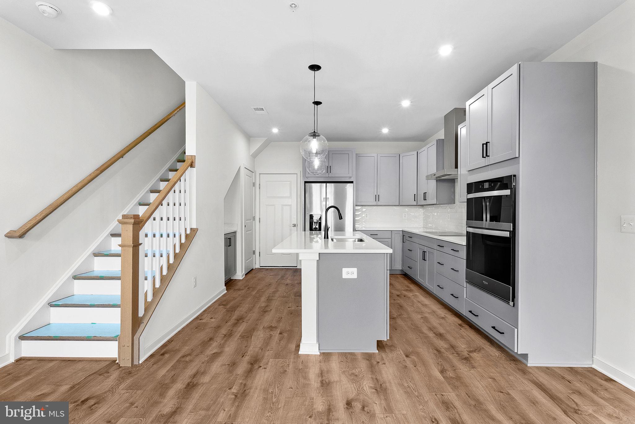 NEW CONSTRUCTION. Special all-in price, ready for immediate move in! Until 6/10,take advantage of a 3.99% 5/1 ARM FHA rate (5.94% APR) with a Choice Lender*.With this 5/1 Adjustable Rate Mortgage, you can lock in a lower, predictable payment forthe first five years. See New Home Counselor for Details. Welcome to the Monroe, abrand-new stacked townhome condo in the highly desirable Belmont Park community inAshburn, VA. This 2-level luxury home with a 1-car garage is perfect for those ready tomove quickly! Featuring 3 bedrooms and 2.5 baths, this thoughtfully designed floor planoffers an open-concept layout ideal for modern living. The chef- inspired kitchen boasts42” cabinets, LED lighting, quartz countertops, and stainless- steel Whirlpoolappliances—perfect for entertaining or everyday convenience. Upstairs, the spaciousprimary suite includes a generous walk-in closet and a luxury bathroom with raiseddouble vanities and a walk-in spa shower. Hometown heroes get $2,500 (restrictionsapply; see New Home Counselor for details). The garage is equipped with an EVcharger-compatible outlet, making this home future- ready. Enjoy low-maintenanceliving with snow removal, lawn care, and exterior upkeep all handled for you—giving youmore time to enjoy life, not maintain it. Belmont Park offers resort-style amenitiesincluding bocce ball, volleyball, playgrounds, and community greenspace. Located inAshburn, you’ll have quick access to major roadways, Dulles Airport, and endless diningand entertainment options like Cooper’s Hawk Winery and TopGolf. Beazer Homes atBelmont Park are designed to live better day to day, with energy efficient constructionthat lowers monthly utility costs, thoughtful design options that make personalizationsimple, and Mortgage Choice, where our top lenders help you compare options andsave money on your home loan. This high-performance home is built to lower your totalcost of homeownership through reduced utility bills, durable materials, and high-qualityconstruction that minimizes long-term maintenance costs. Beazer Homes is proud to beAmerica’s #1 Energy Efficient homebuilder. Our FY25 average gross HERS score of 32(38 excluding solar) was the lowest of the publicly reported scores among the top 30U.S. homebuilders by volume identified by Builder Magazine’s Top 100 List (based on2025 total closings). Get protection against rising energy costs without changing howyou live. Every Beazer home is pre-wired for solar, making it easier and more affordableto add a renewable system when you are ready. Model Home Hours: Mon–Sun, 11AM–6PM. Use 19758 Misty Moss Square Ashburn, VA 20147 for GPS directions.Photos of actual home.