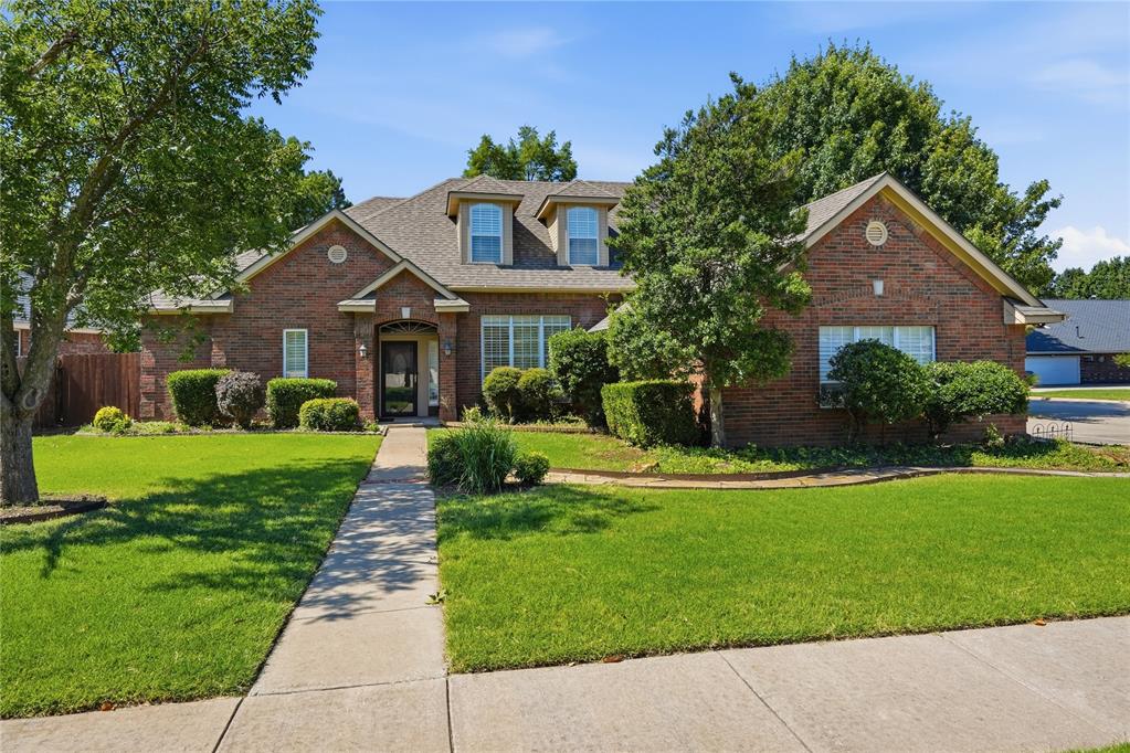 Brookhaven welcomes you home with space, flexibility, and a location that’s hard to beat! Situated on a generous corner lot spanning approximately 0.30 acres, this 4 bedroom, 3 and a half bathroom home offers just over 3,000 square feet with a traditional layout designed for comfortable everyday living. Step inside to find a formal dining room that flows into a sitting area before opening to the heart of the home. The main living room is anchored by a beautiful brick fireplace and connects seamlessly to the spacious kitchen, complete with abundant counter and cabinet space, stainless steel appliances, a gas range, pantry, and room to gather. The split floor plan provides privacy for the primary suite, which is filled with natural light and features an ensuite bathroom with dual vanities, a jetted tub, separate shower, water closet, and an oversized walk-in closet. Secondary bedrooms are generously sized and versatile to fit a variety of needs. Outside, enjoy a large backyard with mature trees, established landscaping, and a covered patio perfect for relaxing or entertaining. Additional highlights include two living areas, two dining areas, a 3-car garage, in-ground storm shelter, and a roof replaced in 2021. Conveniently located in west Norman within walking distance of Truman schools and just minutes from shopping, dining, and entertainment, this Brookhaven home offers the space and setting you’ve been looking for!