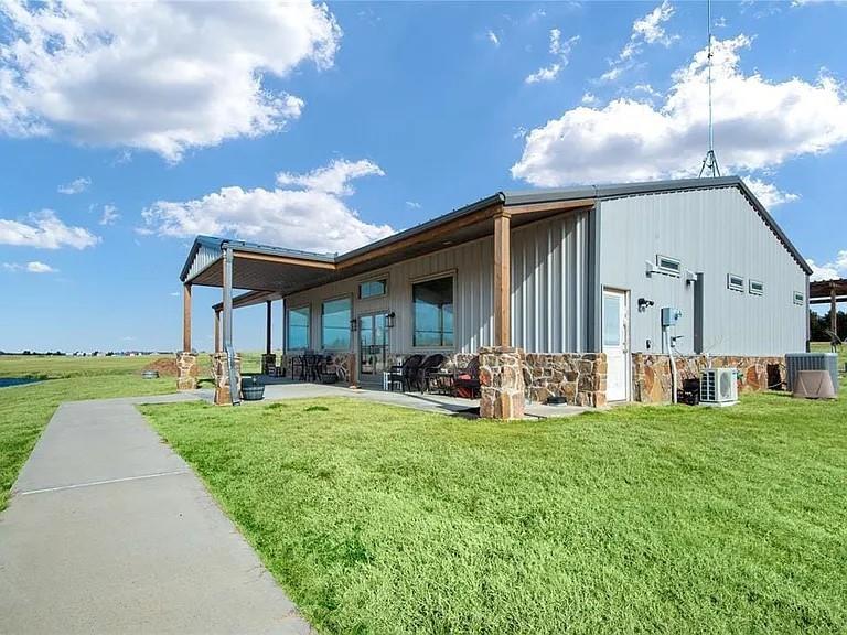 Your Dream Oasis Awaits Near LAKE TEXOMA, Rock Creek, right in the heart of HORSE COUNTRY. Discover a World of Opportunities on this Sprawling +-16 Acre Mixed-Use Estate with a Modern 2018-built 3 Bed 2 Bath Home. Craft Your Ideal Oasis: Design your personal sanctuary! Build Your Dream Home! Cultivate Your Business: Transform the event center into your own enterprise hub. Revel in Nature: Immerse yourself in serene landscapes. Expansive Event Venue is Awaiting your Entrepreneurial spirit, with kitchen and bathroom potential. Enchanting Patios: Embrace the panorama from the wrap-around patio overlooking the pond. Versatile Outbuildings: Create your own animal accommodations right in horse country! Refrigerated 30x20 and spacious 40x60 warehouses. Winery Heritage: Continue a legacy of wine tastings. Use this as your Canvas for Your Lifestyle, Your Investment.