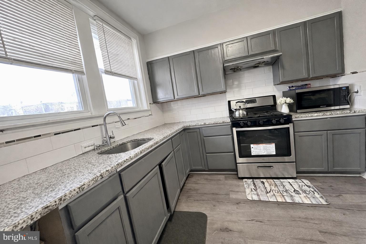 This charming interior row townhouse, offers a perfect blend of classic character and modern convenience. With 1,140 square feet of thoughtfully designed living space, this home is ideal for those seeking comfort and style in a vibrant Philadelphia neighborhood. Step inside to discover a warm and inviting atmosphere, enhanced by the recent renovations that have revitalized the entire space. The open layout seamlessly connects the living and dining areas, creating an ideal setting for both relaxation and entertaining. The durable vinyl flooring throughout adds a contemporary touch while ensuring easy maintenance. The kitchen, a focal point of the home, is ready for your culinary adventures. Its efficient design allows for easy movement and functionality, making meal preparation a delight. This home features three cozy bedrooms, each offering a peaceful retreat at the end of the day. The full bathroom has been updated to provide a fresh and modern feel, ensuring comfort for all who reside here. The unfinished basement presents a blank canvas for your imagination-whether you envision a home gym, a playroom, or additional storage space, the possibilities are endless. Parking is a breeze with an attached garage, providing convenience and security for your vehicle. The small lot size means less yard work and more time to enjoy the local amenities and community. Located in a vibrant Philadelphia neighborhood, this home is just a short distance from parks, shops, and dining options, making it easy to enjoy the best of city living. With its blend of historic charm and modern updates, this townhouse is not just a house; it's a place to create lasting memories. Don't miss the opportunity to make this inviting space your new home!