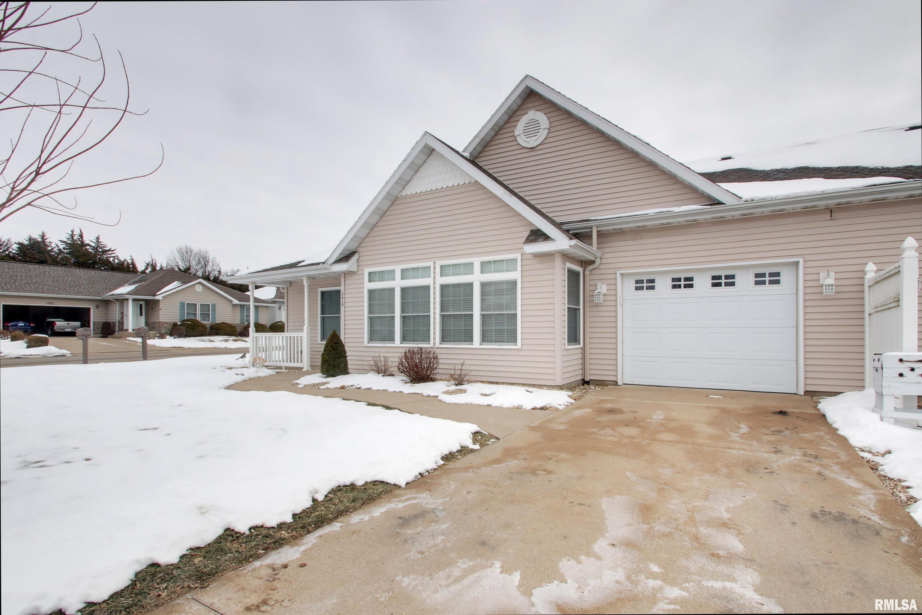 Move-in ready end-unit condo in a desirable location featuring true one-level living—no stairs! Wide doorways, vaulted ceilings, a primary suite with walk-in closet and full bath with a zero entry shower, plus a bonus room (no egress) with a half bath. Kitchen island, vinyl plank flooring, and a one-car attached garage. Monthly association fee of $125 includes lawn care and snow removal. All appliances convey. Easy living starts here. Don't wait- call for a showing today!