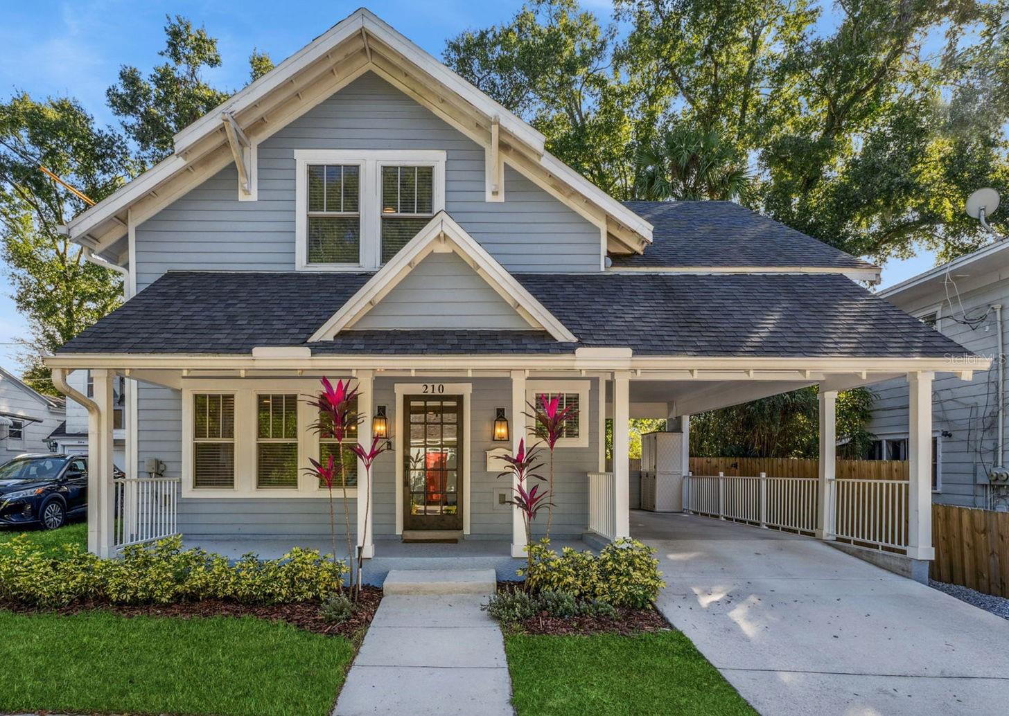 Tucked in the heart of one of Orlando’s most iconic neighborhoods, Lake Eola Heights, this custom 3-bedroom, 2.5-bath home is a modern interpretation of historic charm. Built in 2022, every detail was thoughtfully curated—from wide-plank wood floors and an open-concept layout to finishes that blend timeless character with contemporary comfort. The bright, open kitchen is both stylish and functional, featuring sleek white shaker cabinetry, stainless steel appliances, upgraded lighting, and a picturesque window over the sink. Upstairs, you’ll find all three bedrooms, two full baths, and a convenient laundry room—creating a private retreat separate from the main living spaces. The primary suite offers dual walk-in closets and a private balcony with stunning views of the downtown Orlando skyline—perfect for morning coffee or evening unwinding. Just five blocks from Lake Eola Park, the weekly Farmers Market, and some of the city’s best dining and entertainment, this home pairs neighborhood tranquility with an unbeatable downtown lifestyle. With no HOA and a location that captures the best of Orlando’s historic and modern energy, 210 Hibiscus Ct is truly where classic character meets contemporary living.