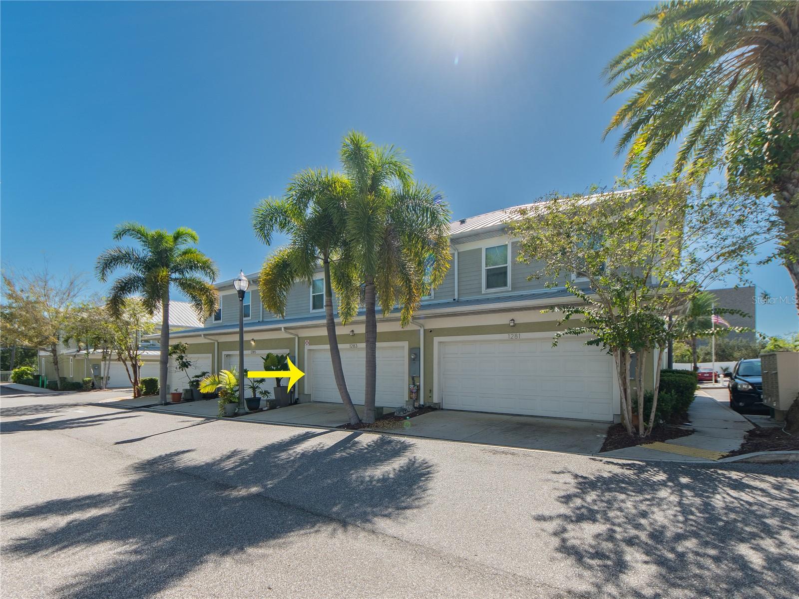CHARMING CLEARWATER TOWNHOME WITH 2-CAR GARAGE AND COMMUNITY POOL! Discover the perfect combination of comfort, convenience, and Florida living in this spacious 3-bedroom, 2.5-bath townhome located in the desirable Country Club Townhomes community, directly across from historic Clearwater Country Club! Built in 2013, this two-story residence offers approximately 1,300 square feet of living space with an inviting, open-concept floor plan designed for everyday living and entertaining.Step inside to discover a bright and welcoming interior featuring high ceilings, a spacious great room, and a kitchen with wood cabinetry, granite countertops, and ample storage and preparation space. The thoughtfully designed floor plan provides comfortable gathering spaces downstairs while keeping the bedrooms privately situated upstairs. The primary suite offers a relaxing retreat, complemented by two additional bedrooms ideal for guests, a home office, or flexible living arrangements. An attached TWO-CAR GARAGE provides valuable parking and additional storage.Enjoy the benefits of townhome living in a beautifully landscaped community featuring a RESORT-STYLE SWIMMING POOL, sundeck, and covered pavilion—perfect for enjoying Florida's sunshine without the upkeep of a private pool.LOCATION, LOCATION, LOCATION! Situated across from Clearwater Country Club and just minutes from vibrant downtown Clearwater, Coachman Park, The Sound waterfront entertainment venue, shopping, dining, and the sugar-white sands of Clearwater Beach! Downtown Dunedin, with its charming boutiques, restaurants, breweries, and waterfront attractions, is also a short drive away.Whether you're looking for a full-time Florida residence or a convenient coastal retreat, this Clearwater townhome offers an appealing combination of space, location, and low-maintenance living. Schedule your private showing and discover the Clearwater lifestyle!