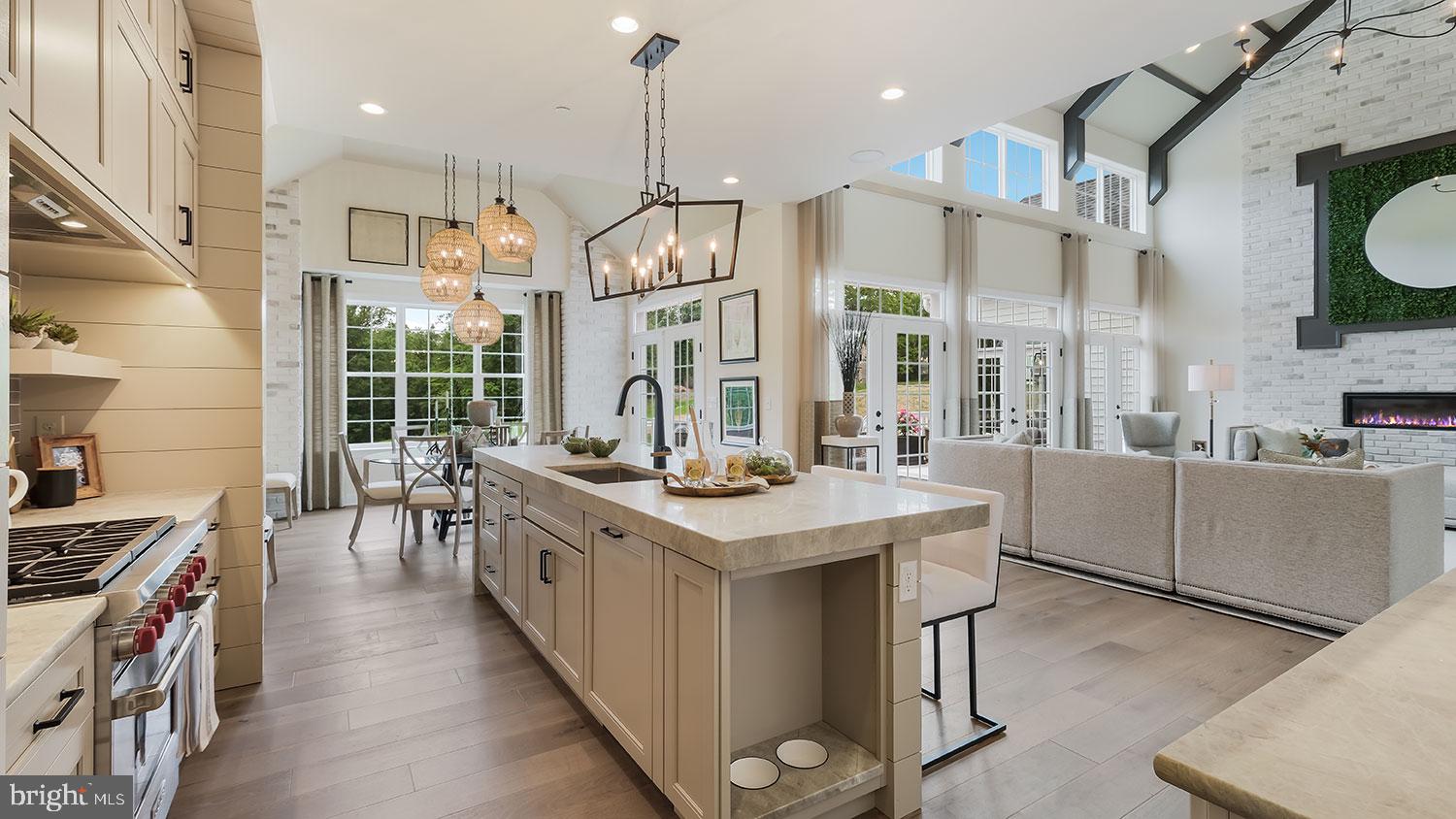 Elevated luxury awaits at The Estates at Stonecliff by Foxlane Homes, an exclusive Glenmoore enclave of 36 estate homes offering the only new construction estate homes on expansive homesites within the prestigious Downingtown Area School District. Set among Chester County’s rolling hills, this exceptional community blends timeless architecture with refined semi-custom craftsmanship. At the heart of The Oxford is a luxurious primary suite conveniently located on the main level—offering privacy, comfort, and effortless accessibility. The spacious bedroom feels like a true retreat, complemented by a spa-inspired bath and generous walk-in closet space. Positioned just steps from the main living areas, it creates a layout that balances connection and quiet, delivering everyday ease without sacrificing elegance. The main living space is equally impressive, anchored by a grand, two-story great room that flows seamlessly into an open-concept kitchen designed for both daily living and memorable gatherings. The Oxford is uniquely suited for families who want space to gather—and space to retreat. Whether hosting extended family, welcoming adult children home, or accommodating long-term guests, a spacious second level with two en suite bedrooms and a central loft allows everyone to enjoy comfort and privacy while remaining beautifully connected. Thoughtfully designed with space, flow, and comfort in mind, the Oxford floorplan offers wide-open living areas, seamless indoor-outdoor connection, and a private first-floor owner’s suite that makes every day feel like a retreat.Foxlane’s semi-custom approach offers exceptional opportunities for personalization, including finished lower levels, bluestone porches, designer cabinetry, premium finishes, and curated details tailored to your lifestyle. Our design team is here to meet with you and make your vision come to life in the house of your dreams. Photos are for representative purposes only. Pricing subject to change. See Sales Representative for details.