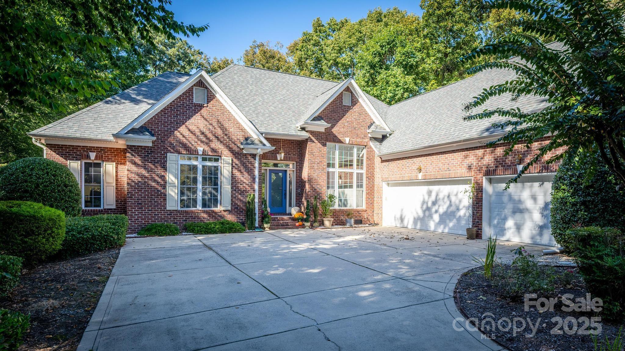 Welcome home to this immaculate ranch ideally situated on the scenic 11th hole of the Westport Golf Course and featuring a gorgeous heated saltwater pool! This custom-built home offers exceptional craftsmanship, architectural detailing, and modern elegance throughout. Step inside to find a bright, open-concept floor plan highlighted by wide-plank wood flooring, tall ceilings, and abundant natural light. The gourmet kitchen will impress with its rich wood cabinetry, granite countertops, stainless steel appliances, tiled backsplash, and large center island perfect for entertaining. The adjoining dining and great rooms flow seamlessly together, anchored by a striking stacked-stone gas fireplace that creates a warm and inviting focal point.
The spacious primary suite is a private retreat with tray ceiling, sitting area, and a stunning stone fireplace. The en-suite bath offers a cathedral ceiling, dual vanities, a garden tub, separate shower, and a generous walk-in closet. The split-bedroom design provides privacy for guests or family, while the upper-level bedeoom with full bath makes an ideal flex space—perfect for a home office, guest suite, exercise room or media room.
Outdoor living is just as impressive! Relax & enjoy your backyard private oasis featuring a large screened porch with a wood plank tall ceiling that overlooks  the fenced backyard and sparkling heated pool, surrounded by a manicured lawn and mature landscaping that add to the sense of privacy and tranquility. A three-car courtyard garage provides ample parking and storage. Located in a private cul-de-sac. Bonus extras in this home: A 325 gallon (owned) above ground propane tank that is for home heating, fire places  & the pool heater. There are also 3 other 100 gallon(leased) above ground  propane tanks to fuel the Whole House Generac Generator & gas stove.
Enjoy the perfect blend of comfort and luxury in this move-in ready home, located in desirable Westport—offering memberships at Westport  golf course & clubhouse.  The Westport Swim & Tennis Club offers memberships with the amenities of: a fitness center, tennis courts, and community pool. Lake Norman is a quick walk down the street! The nearbye Westport Marina offers full boating services, wet slips, & dry stack storage. The Freedom Boat Club also offers boat rental options. Located on the west side of Lake Norman close to shopping & restauants with a quick commute to Charlotte & the international airport.
Don't miss this opportunity to own your own private oasis at Lake Norman!