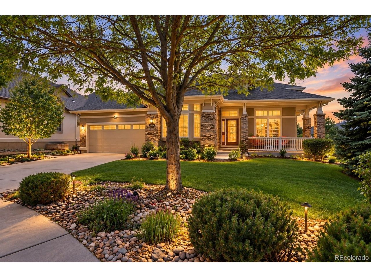 Welcome to this exceptional Legacy Ridge retreat, where elevated design, everyday comfort & breathtaking Colorado views come together beautifully. Enjoy sweeping white-capped Rocky Mountain & Flatiron views. Inside, thoughtfully designed open-concept floorplan is filled with natural light, rich hardwood flooring, and inviting living spaces. The gourmet kitchen features granite countertops, abundant cabinetry, pantry and seamless flow creating the perfect backdrop for hosting family & friends. The spacious primary suite serves as a luxurious private retreat, complete with a spa-inspired five-piece bath featuring dual vanities & an elegant freestanding soaking tub designed for ultimate relaxation. Step outside to a professionally landscaped backyard truly finished "to the nines," where mature shade trees create a peaceful & private outdoor oasis ideal for enjoying Colorado's beautiful summer evenings. The walkout lower level was designed with entertaining in mind, featuring a 2nd kitchen, recreation area with a pool table or game lounge. After a long day, unwind in the hot tub while taking in sunset skies and serene backyard privacy. Adding a truly unique touch, a hidden art studio tucked behind a custom bookshelf entrance offers creativity, character, & a one-of-a-kind conversation piece rarely found in today's market. The oversized 3-car tandem garage provides additional room for hobbies, a workshop & extensive storage. Ideally located near the Legacy Ridge Golf Course with convenient access to parks, trails, shopping, dining & easy commuting to both Denver and Boulder, this home delivers the perfect balance of peaceful suburban living & upscale convenience. From the panoramic mountain views and exceptional outdoor living spaces to the entertainer's basement & hidden studio, this remarkable home offers a lifestyle as unforgettable as its setting.