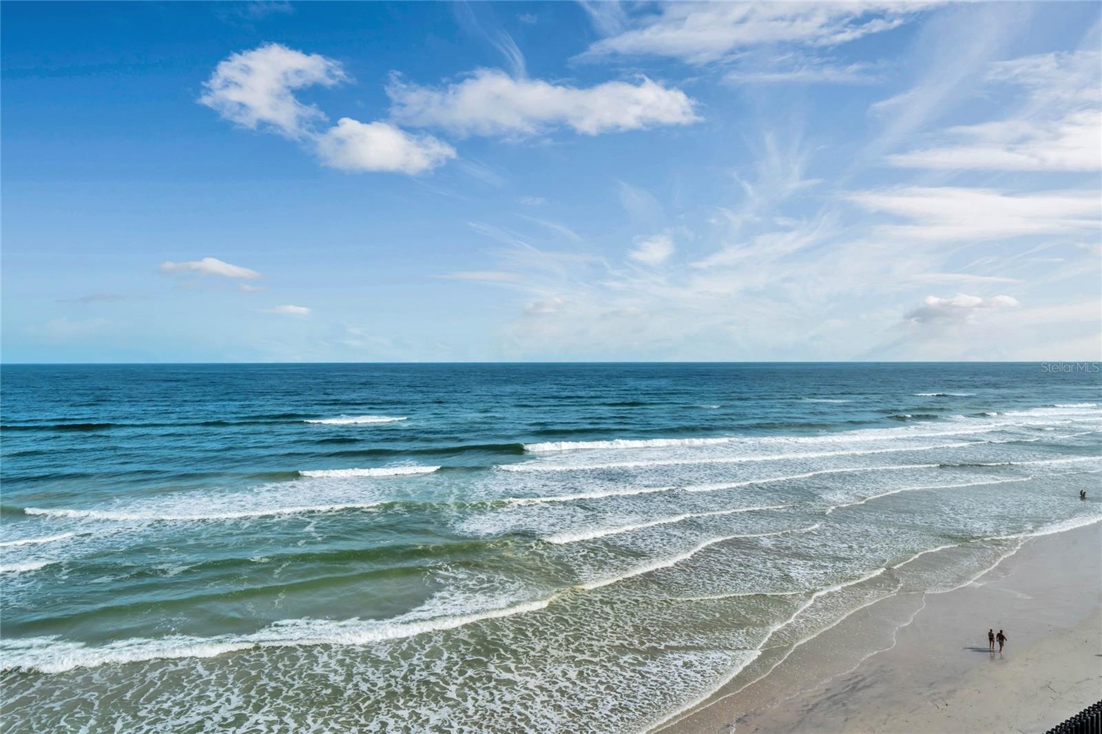 Stunning OCEANFRONT LUXURY CONDOMINIUM. COMPLETELY REMODELED. MOVE-IN-READY. FURNISHED.  DAYTONA BEACH SHORES.   Breathtaking panoramic ocean views welcome you from the moment you step through the front door, creating an immediate sense of peace, relaxation, and coastal elegance.  This exceptional 3-bedroom, 3-bathroom condominium has been thoughtfully redesigned with sophisticated finishes, quality craftsmanship, and an emphasis on both beauty and functionality. Every detail has been carefully curated to deliver the ultimate beachfront retreat where everyday living feels like a vacation. The heart of the home is the beautifully remodeled chef's kitchen, featuring custom cabinetry, superior organizational storage, gorgeous stone countertops and backsplashes, newer appliances, a wine refrigerator, and an open layout that flows seamlessly into the dining and living spaces. Plank tile flooring extends throughout the entire residence, complemented by crown molding, fresh paint, updated lighting, new doors, and custom storage solutions.  The spacious family room opens directly to a private oceanfront balcony, providing endless views of the sparkling coastline. Whether enjoying your morning coffee or unwinding at sunset, the ever-changing beauty of the ocean becomes your daily backdrop.  The luxurious owner's retreat is a true sanctuary, offering direct oceanfront views, private balcony access, an electric fireplace, built-in sauna, floating soaking tub, spacious walk-in shower, dual vanities, and a custom-designed walk-in closet.  A second oceanfront guest suite also enjoys direct balcony access, stunning water views, a walk-in closet, and a private en-suite bath. The third bedroom is equally impressive, featuring built-in shelving, an en-suite bath, and the flexibility to serve as a guest room, office, or creative space.  Additional features include:• Indoor laundry room• Custom closets throughout• Abundant storage space• New HVAC system• Updated electrical and plumbing• Tankless water heater• Offered fully furnished for immediate enjoymentResort-Style Community AmenitiesExperience a lifestyle of comfort, convenience, and security with:• 24-hour secured lobby and surveillance• Bright, welcoming lobby and social spaces• Multiple elevators• Resident lounge and entertainment areas• Fitness center• Billiards and recreation room• Conference and gathering space• Two oceanfront pools with spas• Fire pit area with Adirondack seating• Pet-friendly walking areas• Designated garage parking• Immaculate garage and recycling facilitiesPerfectly located near shopping, dining and fine dining, entertainment, airports, local golf courses, mini-golf, the convention center, Daytona Speedway, Jackie Robinson Ballpark, Ponce Inlet and more, this EXTRAORDINARY RESIDENCE IN BEAUTIFUL DAYTONA BEACH SHORES, offers everything you could desire in luxury coastal living.  Reserve your showing now!