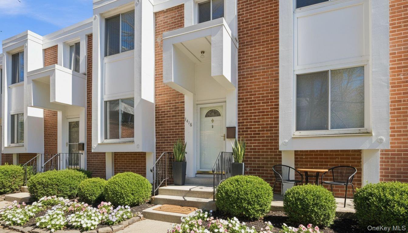 Spacious end-unit townhouse-style condo in The Colony offering 4 bedrooms and 2.5 baths with approx. 2,500 sq ft of living space. Features include a garage and driveway with storage loft, walk-out patio off the den (ideal for a home office), balcony off the living room, and abundant closet/storage space. Enjoy an eat-in kitchen adjacent to the dining room, a large living area with patio doors, and a convenient upstairs laundry setup. Recent upgrades include Samsung kitchen appliances (approximately 3 years old), a new hot water heater with filter, and washer and dryer (approximately 2 years old). Community amenities include multiple kiddie parks, plenty of guest parking and both adult and kiddie pools. Excellent location within walking distance to shopping and dining (Trader Joe’s, Best Buy, CVS, Marshalls), quick access to White Plains and two Metro-North stations with easy NYC transportation options. HOA fees include water. Great opportunity for low-maintenance living close to conveniences, parks, and transit. Some pictures have been digitally edited to show full potential.