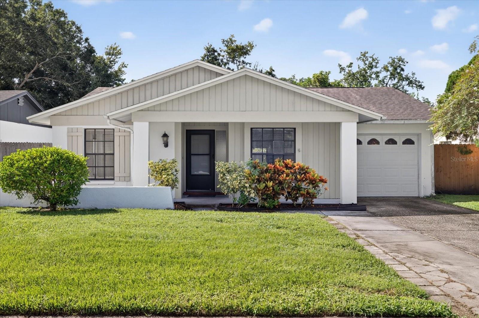 Welcome to this beautifully maintained 3-bedroom, 2-bathroom home with 1,285 sq. ft. of living space and a 1-car garage, located in the highly sought-after community of Palm Harbor. Presently sitting high and dry in Flood Zone X, no flood insurance is currently required—adding long-term peace of mind. Also currently  Zoned for top-rated Palm Harbor schools (Highland Lakes, Carwise, and Palm Harbor University), this home is perfect for families looking to be in one of the best districts in Pinellas County. No present HOA as an added plus!   Step inside to soaring vaulted ceilings and an open floorplan where the kitchen overlooks the great room—an ideal layout for entertaining and everyday living. The split bedroom design ensures privacy, while tile flooring flows seamlessly through the main living areas for easy maintenance. Freshly painted inside and out, this move-in-ready home also features a roof replaced in 2015 (per public records), giving buyers one less big-ticket item to worry about. Outside, the fenced backyard provides a private space for pets, play, or simply enjoying Florida evenings. Whether you’re a first-time homebuyer, downsizing, or an investor searching for a solid property in a high-demand area, this is an excellent opportunity. The location offers unbeatable accessibility to nearby shopping, dining, and major roadways—making the daily commute effortless and weekend fun just minutes away.