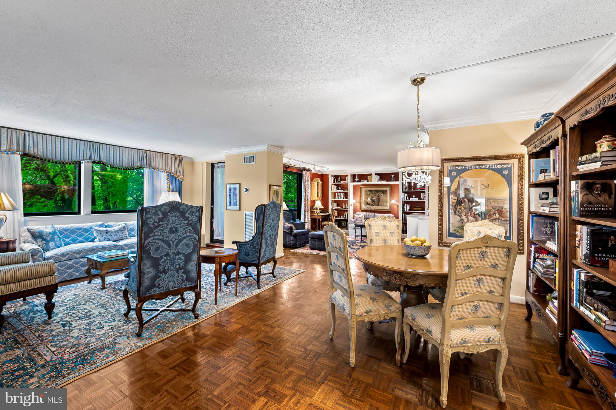 Step into luxury and sophistication with this impeccably renovated condominium in the prestigious Harper House at the Village of Cross Keys. Originally designed as a 3BR/2FB/1HB unit, this home has been thoughtfully reimagined to include a spacious 2BR/2FB plus library and a large pantry, offering both functionality and elegance (original floor plan available for reference). Every inch of this 1,701 sq. ft. residence has been transformed by a professional interior designer, showcasing exquisite craftsmanship and attention to detail. Sunlight streams through expansive windows, highlighting the lush views of the Village below. Crown moldings, custom built-ins, and stylish bookshelves add timeless charm, while the brand-new kitchen dazzles with select cabinetry, sleek quartz countertops, and a chic backsplash. Both full bathrooms have been meticulously updated to create spa-like retreats.This is truly a turn-key opportunity—move in and start enjoying your dream home immediately. Harper House offers the ultimate in convenience with full-service concierge and doorman amenities, and the condominium fee covers all utilities. Nestled in a prime location, the Village of Cross Keys is a commuter’s dream. Take advantage of scenic walking paths, explore the newly revitalized retail shops, and embrace the vibrant lifestyle this community has to offer. Don’t miss your chance to own this stunning piece of modern elegance in one of Baltimore’s most sought-after neighborhoods!