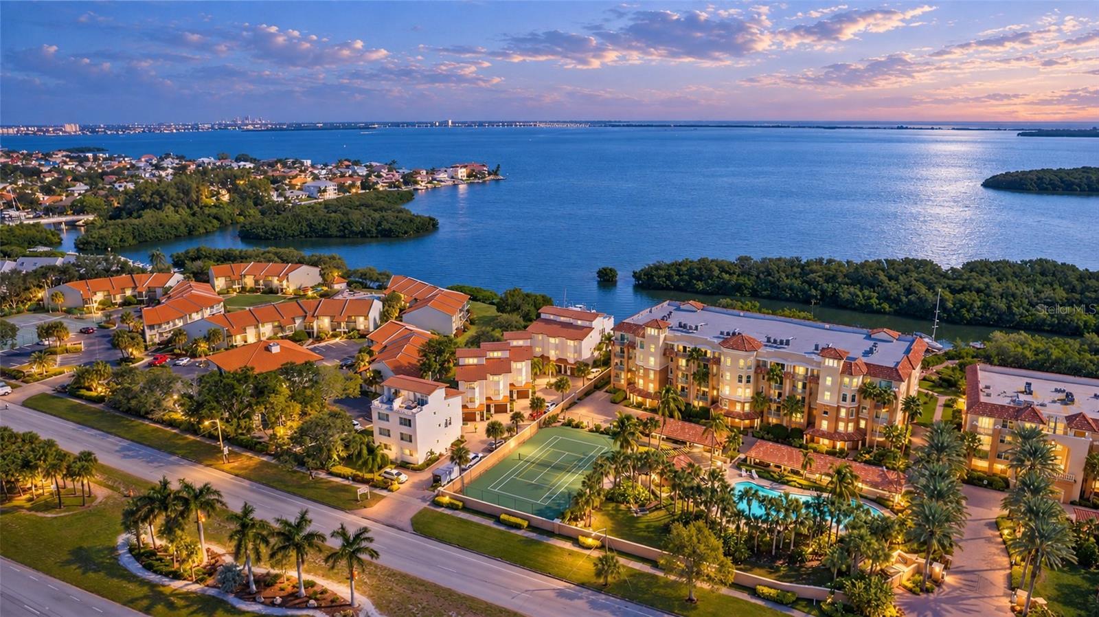 At the quiet southern end of Tierra Verde, the last stretch of island before Fort De Soto, this end-unit townhome sits on a sheltered waterfront cove in an extraordinary community of just eightowners. Dolphins, manatees and coastal birds are regular visitors to the cove, and east and westexposures fill the home with light from morning to evening.All day long you’ll enjoy water views from this residence, which offers 3 bedrooms and 3.5baths plus a top-level bonus room. The home features luxury vinyl plank flooring, with customboxed stair treads that bring a modern feel throughout the unit. The lower level holds a guestsuite with a full bath and its own private entrance, giving visitors flexibility and privacy, plus aone-car garage with room for storage. The primary suite overlooks the water and includes awalk-in closet and an ensuite bath; a second guest bedroom gives family and friends acomfortable room of their own. The expansive patio outside the upper-level bonus room, withviews out over Tampa Bay, is the natural spot for morning coffee or an evening with friends.Tierra Del Mar is a boutique townhome community that is expertly managed, with amplereserves, low fees, a new roof, well-kept grounds and an arrangement for owners to use the resortpool immediately next door. One of the most coveted aspects of the community is its waterfrontpositioning, with kayak storage and launching facilities that make exploring these remarkablewaterways that much more accessible.Tierra Verde is the gem of Pinellas County, reached by the Pinellas Bayway and surrounded byBoca Ciega Bay, Tampa Bay and the Gulf passes. The island has its own marinas and waterfrontdining, and the Gulf is a short run by boat through Pass-a-Grille Channel or Bunces Pass, withShell Key Preserve just across the channel. Across the Bayway, the island park has courts fortennis and pickleball. Pass-a-Grille and St. Pete Beach are a short drive west; downtown St.Petersburg’s restaurants, shops and museums are about 20 minutes by way of the Bayway and I-275, which continues on to Tampa International Airport.Just south of Tierra Del Mar, the Bayway crosses into Fort De Soto Park, the largest park in thePinellas County system: 1,136 acres across five keys, with beaches that have been named thebest in America, a campground, fishing piers, a paddling trail, a dog beach, a Spanish-AmericanWar-era fort and ferries to Egmont Key and Shell Key. Because the road ends at the park, TierraVerde sees no through traffic, which is why this end of the island stays so quiet.