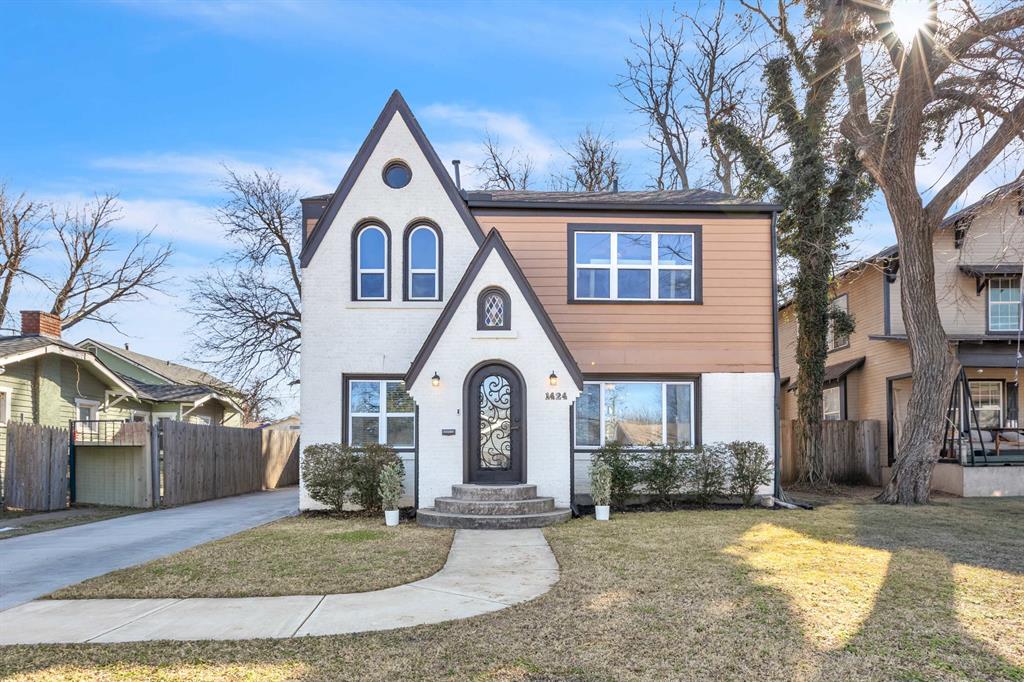 This thoughtfully redesigned home packs a punch—blending luxury finishes, exceptional value, and an unbeatable central location near Penn Square, Classen Curve, The Oak, Whole Foods, and Trader Joe’s. A striking arched entry with stained glass sets the tone as you step into an open, light-filled living, dining, and kitchen space with rich stained wood floors throughout—ideal for both everyday living and entertaining. Natural light pours into the custom kitchen featuring a built-in oven and microwave, gas range, quartz countertops, farmhouse sink, and a sleek beverage bar. The combination of thoughtful design, major system upgrades, and central location makes this home a standout in its price range. Kitchen and baths have been fully updated with timeless designer tile, fixtures, and hardware. The flexible floor plan offers two bedrooms and one bath downstairs, plus a private primary suite and two additional bedrooms upstairs—well-suited for five bedrooms or four bedrooms with an office. The spa-like primary en-suite includes custom cabinetry, a double vanity, soaking tub, oversized shower, and generous built-in storage. Seriously, heavenly!Out back, enjoy a private retreat with a deck, large yard, and a stock tank pool with filter system and surrounding deck—perfect for relaxing or entertaining. This home delivers high-end design, smart upgrades, and a prime location in one exceptional package. Extensive upgrades to the home’s major systems reflect thoughtful ownership and long-term investment. Please inquire with real estate agent for extensive list of upgrades!