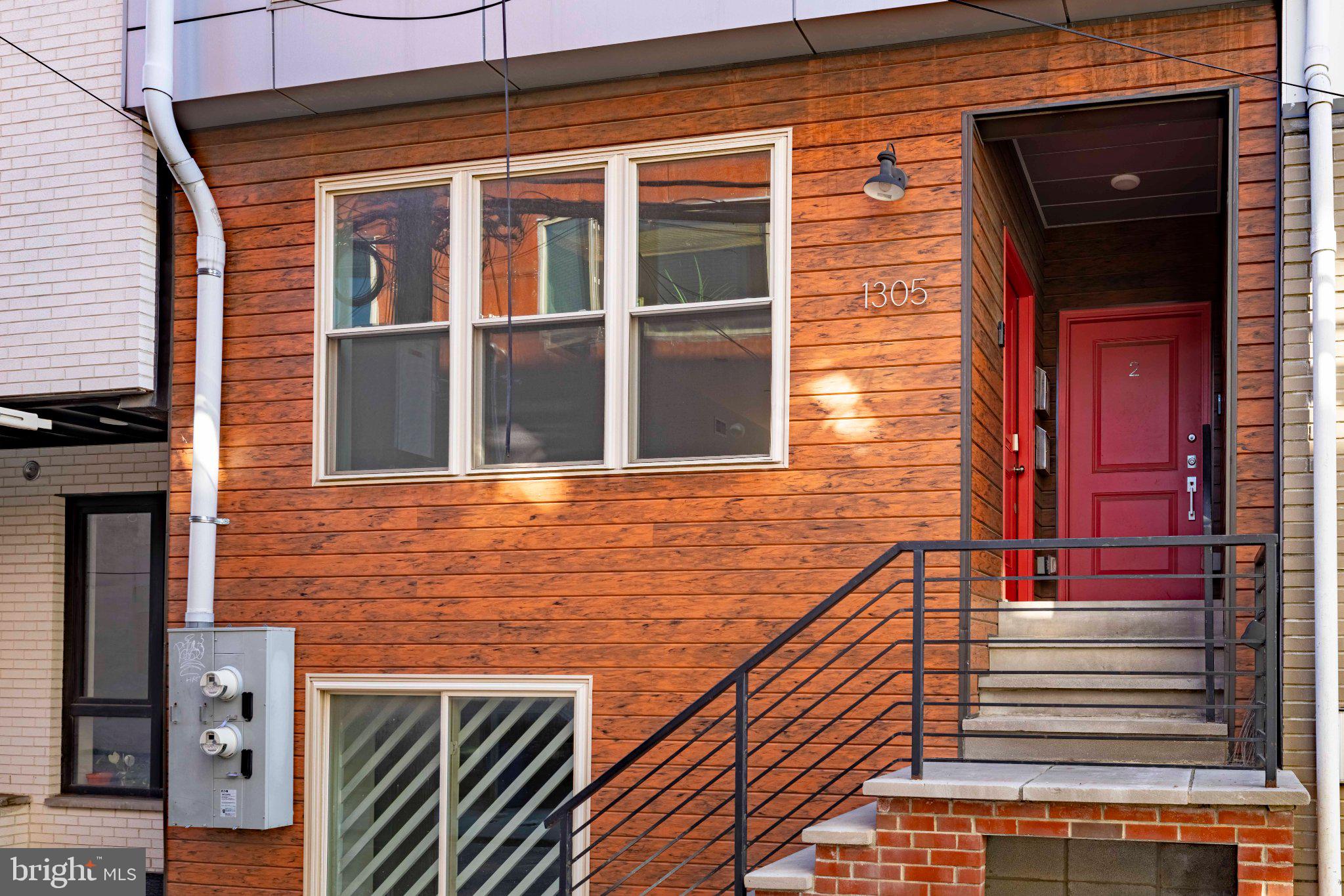 Modern finishes, a fully fenced private patio area, and a fantastic location near the best of Fishtown and Northern Liberties—welcome to 1305 N Hope Street, Unit A (1). Built in 2017 and still benefiting from the remaining tax abatement, this immaculate two-bedroom, two-bath condominium offers move-in-ready living with low condo fees of just $125.42 per month. Freshly professionally painted, it’s ready for its next owner to settle in and enjoy.The open-concept main floor creates an inviting setting for everyday living and entertaining, with recessed lighting throughout and a gorgeous modern kitchen at its center. Stainless steel appliances, an island-mounted cooktop, and a striking stainless steel vent hood bring together style and function. Outside, the fully fenced private yard offers your own outdoor retreat for morning coffee, dining under the stars, or relaxing with friends.The primary bedroom features an en-suite bathroom and walk-in closet, while the second bedroom offers a generously sized closet of its own. A second full bathroom with a tub, a large walk-in hallway closet, and an in-unit washer and dryer add the storage and convenience that make daily life easier.Enjoy easy access to Frankford Avenue and surrounding area restaurants, bars, coffee shops, and boutiques, along with the dining and nightlife of nearby Northern Liberties. Neighborhood parks and the waterfront green space at Penn Treaty Park offer plenty of opportunities to get outside, while nearby Girard Station on the Market-Frankford Line makes getting into Center City convenient. With private outdoor space, beautifully maintained interiors, and so much to explore close to home, this condo is ready for its next chapter.