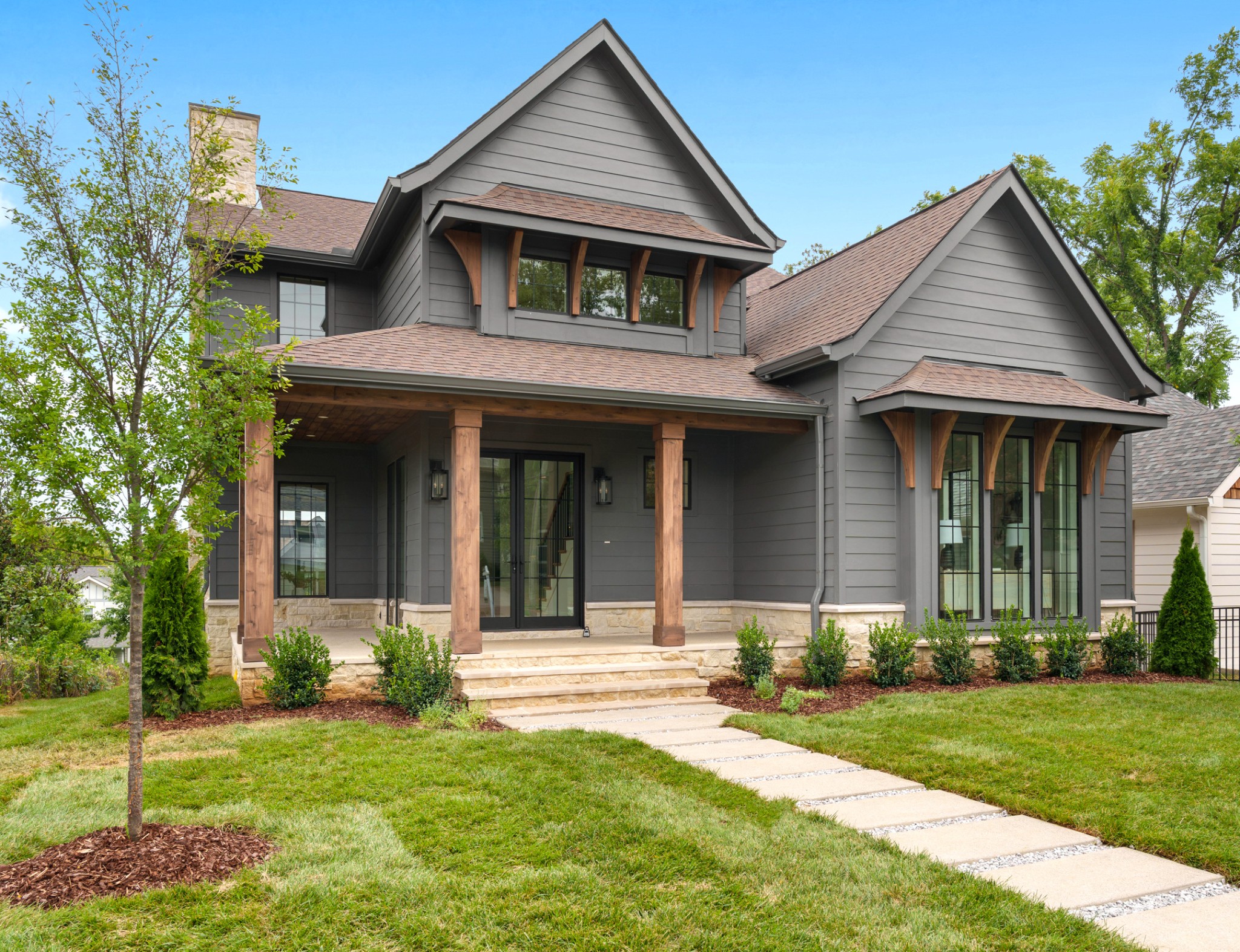 Jaw-dropping new build designed by the incredible August House Co., decked out with top-of-the-line EVERYTHING. This one is a MUST see in person to savor all of the details. As soon as you walkthrough the front door you are greeted with gorgeous natural light, overwhelmingly tall ceilings, and a unique floor plan with a primary suite fit for Architectural Digest. Oversized living space with breathtaking hilly views 
& fireplace, covered back deck w/ wood-burning fireplace, chef-style luxury kitchen featuring Thermador Appliances, hidden butler's pantry, and a raised wet bar leading to your private dining room, main floor primary suite with soaking tub, steam shower, heated floors, and oversized walk-in closet. Open staircase leading to second floor with 3 beds & a bonus/rec space and a private home-office space. Pool can be added to the back yard. Detached garage with additional studio/flex space above with half bath & great storage. Would be the perfect music studio! Unique design with a luxury "mountain home" vibe with no detail spared. Pre-wired speakers, irrigation system, and built by the renowned Mackenzie Construction (known for their quality). Location is top-notch; walking distance to everything you love about East Nashville. Just 3 minutes to downtown and less than a mile to shops/restaurants/bars, etc. POOL CAN BE ADDED AFTER CLOSING FOR ADDITONAL COST.