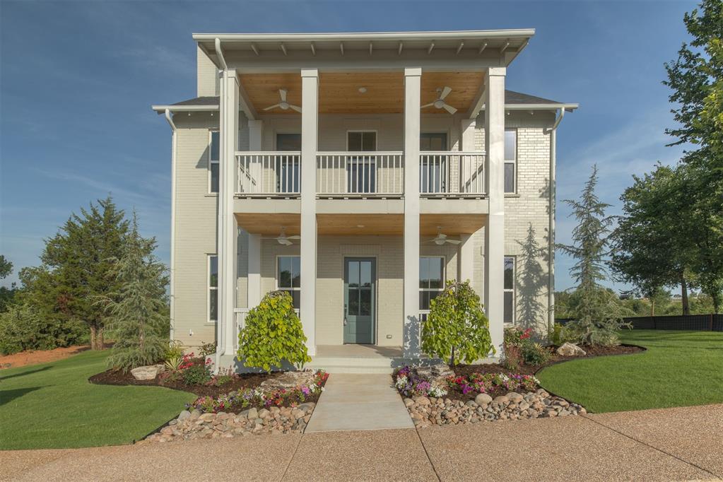 Nestled directly across from Talulla Pond this exquisite property is a haven of beauty and elegance. Designed to blend harmoniously with its breathtaking natural surroundings, the home combines architectural sophistication with modern comfort, making it an ideal retreat for those seeking peace and luxury. The open-concept living area is the heart of the home complete with hardwood floors and a cozy fireplace. Perfect for gatherings. A gourmet kitchen comes complete with state-of-the-art appliances, quartz countertops, a central island, and ample storage, designed for culinary enthusiasts. The master suite, located down an elegantly appointed hall, allows for maximum privacy. It truly feels luxurious. Each spacious bedroom upstairs features large windows that frame uninterrupted views and allow natural light to flood the space. Two of these bedrooms enjoy access to the deep, covered balcony with waterfront views of tranquil Talulla Pond. The perfect place to sip your morning coffee. You really must experience it yourself!