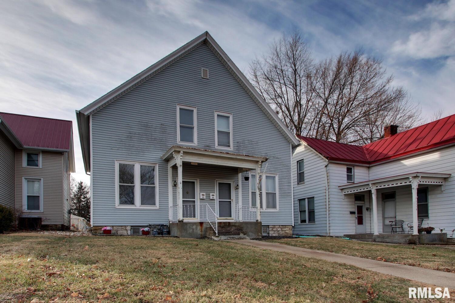 Great 2-unit investment property. Currently bringing in $950/mo in rent income for only one unit. Both units are 2 bed 1 bath. There's additional income potential with the 24x27 garage. This property would also be a great house hacking option where you live in one side while the tenant pays most of the mortgage. Or rent the vacant unit to your preferred tenant and double the income or more! Take a look today!
