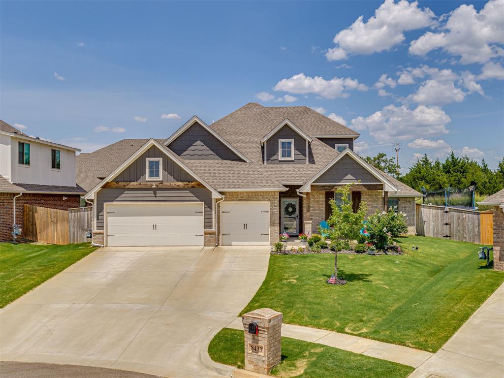 Tucked into the welcoming Cherry Hill neighborhood, this fabulous 2023-built home brings together modern comfort, thoughtful design + the kind of community you'll love being a part of. A generous front porch welcomes you in where soaring ceilings, abundant natural light & beautiful architectural details make an impression. The spacious living room features a stacked stone gas fireplace, coffered ceiling, and three oversized 7-foot windows with electric blinds, creating a bright and inviting space. The kitchen is equally impressive with ceiling height cabinets, 3cm countertops, an oversized center island and a plenty of storage. Whether you're preparing everyday meals or entertaining a crowd, this kitchen is designed to handle it all while looking beautiful. The primary suite provides a peaceful retreat with dual vanities, a Jetta whirlpool tub, separate walk-in shower, and a generous walk-in closet with direct access to the laundry room. 3 additional bedrooms and a full bathroom complete the main level, including one room that would make an excellent home office. Upstairs, you'll find a spacious bonus room, 5th bedroom and 3rd full bath, offering endless possibilities. The outdoor living area is just as inviting. The covered back patio is equipped for entertaining & enjoying Oklahoma sunsets with a wood-burning fireplace, TV hookup, and gas line for your grill. The fully fenced backyard features two gates + a sprinkler system for easy maintenance. Other upgrades include a storm shelter, whole-home air purification system, and tankless water heater. Situated in the award winning Edmond School District, Cherry Hill offers a true sense of community that extends well beyond your front door. Enjoy a neighborhood basketball court, soccer field, playground & community events. Beautifully maintained & located in a neighborhood that makes coming home even better, Lambert Way has so much to offer! Be sure to explore the Features Page for the complete list of amenities.