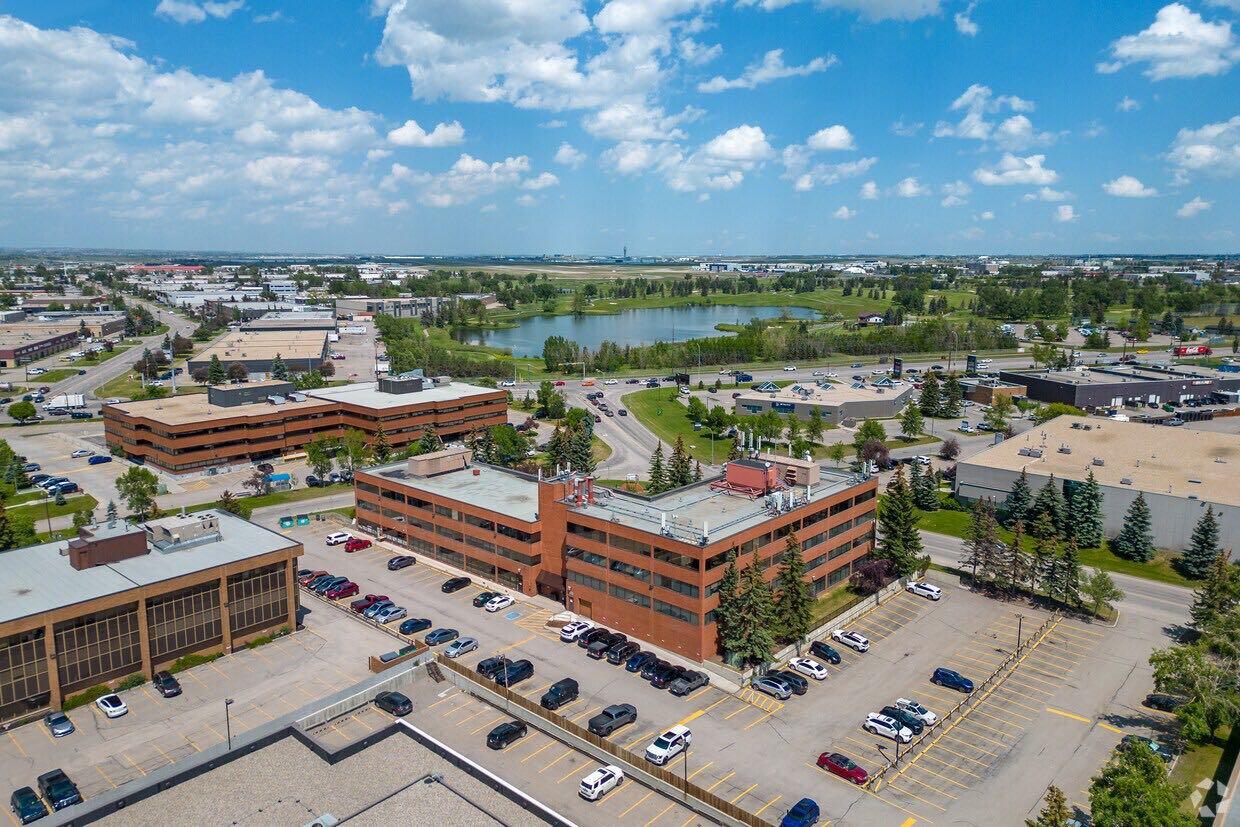 This is a a Court of Kings Bench ordered sale. Explore an exceptional investment opportunity with this well-maintained 4-storey office building in a highly accessible NE Calgary location. The property is 73,030 sq.ft, class B, suburban office and was constructed in 1980 and features professional, long-term tenants, strong on-site parking and attractive curb appeal with manicured landscaping. Ideal for an investor seeking to add value or someone looking to occupy the vacant portions of the building (approximately 27,000 sq.ft). The total site size is 2.3 acres and contains 170 paved surface parking stalls which supports an excellent parking coverage for tenants and visitors. The classic red-brick exterior, elevator service and a welcoming atrium/lobby area create an inviting environment for an array of business types, along with advantageous signage exposure to 12th Street NE. The flexible suite mix from small private offices to larger floor plates makes it easy to relet or reposition for higher rents or alternate office/co-working configurations. There are strong transportation links: immediate access to 32 Ave NE and Deerfoot Trail for quick highway connectivity; Strategically located in NE Calgary’s business nodes with nearby retail and service amenities and solid exposure to commuter routes — attractive to professional and service tenants.