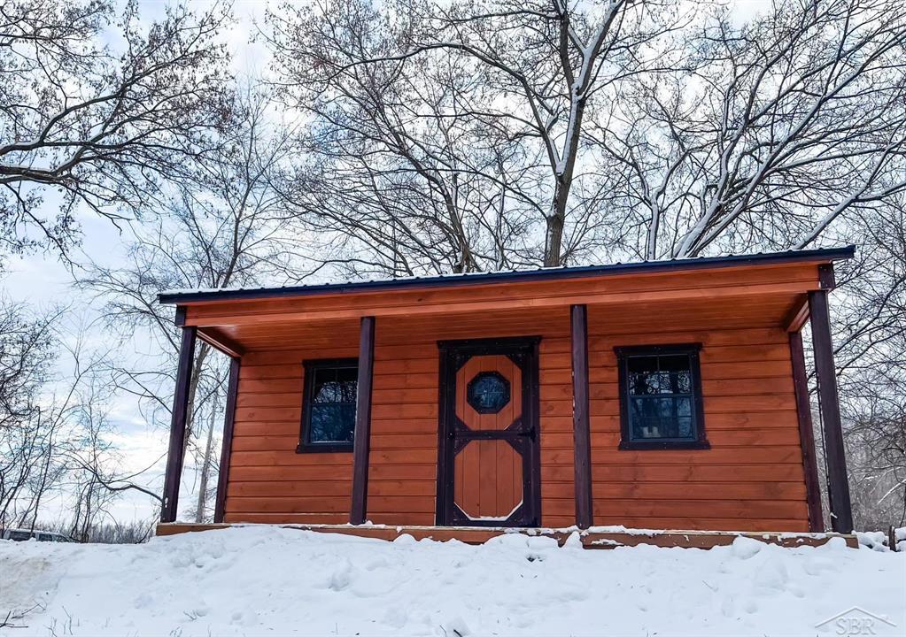 Luxury Heated Deer Blind on this beautiful 26.93 acre property with 1936 feet of water frontage on the Cass River! Decades of Quality Deer Management have consistently yielded some of the largest trophy bucks in the area on this property. Buck photos are from 2023. Secluded river fishing for Smallmouth bass, walleye, yellow perch, and northern pike on your own nearly 2,000 feet of private water frontage. Hundreds of additional pictures show the finest hunting and fishing in the area. Approximately 8 acres wooded. 16 acres planted to Big blue Stem providing dense cover for a fantastic deer herd. 3 acres of perennial food plots that hold deer and turkeys on the property all year long. Well maintained trails for hunting or for recreation. Property part of a conservation benefits program. City water and natural gas is available at the road if you want to build.