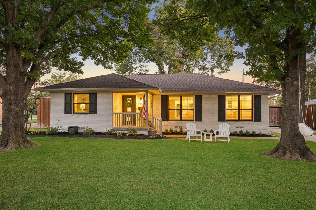 A rare find on one of Lake Ridge Estates’ most desirable streets! This charming, move-in-ready home blends timeless charm with thoughtful updates and designer touches on an oversized 0.24-acre lot. Taken to the studs in 2018 and an additional designer refresh in 2024, the home features an open-concept floor plan, beautiful hardwood floors, and abundant natural light. The kitchen offers custom cabinetry, an oversized island, stainless steel appliances, and ample storage. In 2024, custom built-ins were added throughout the home, maximizing storage in the kitchen, dining area, living room, and laundry room. Designer lighting, including Visual Comfort sconces and a statement dining chandelier, adds a sophisticated touch. The primary suite features a walk-in closet and an updated ensuite bath with new tile, a new shower pan, and a new Kohler toilet in 2026. System improvements include updated electrical, HVAC, windows, spray foam insulation, and a tankless water heater, along with additional HVAC enhancements. Outside, enjoy a spacious, tree-shaded yard, an automatic driveway gate, a board-on-board privacy fence, a detached two-car garage, and a backyard storage shed. Just a short walk from Lake Highlands Elementary, this beautifully updated and thoughtfully designed home is ready to enjoy!