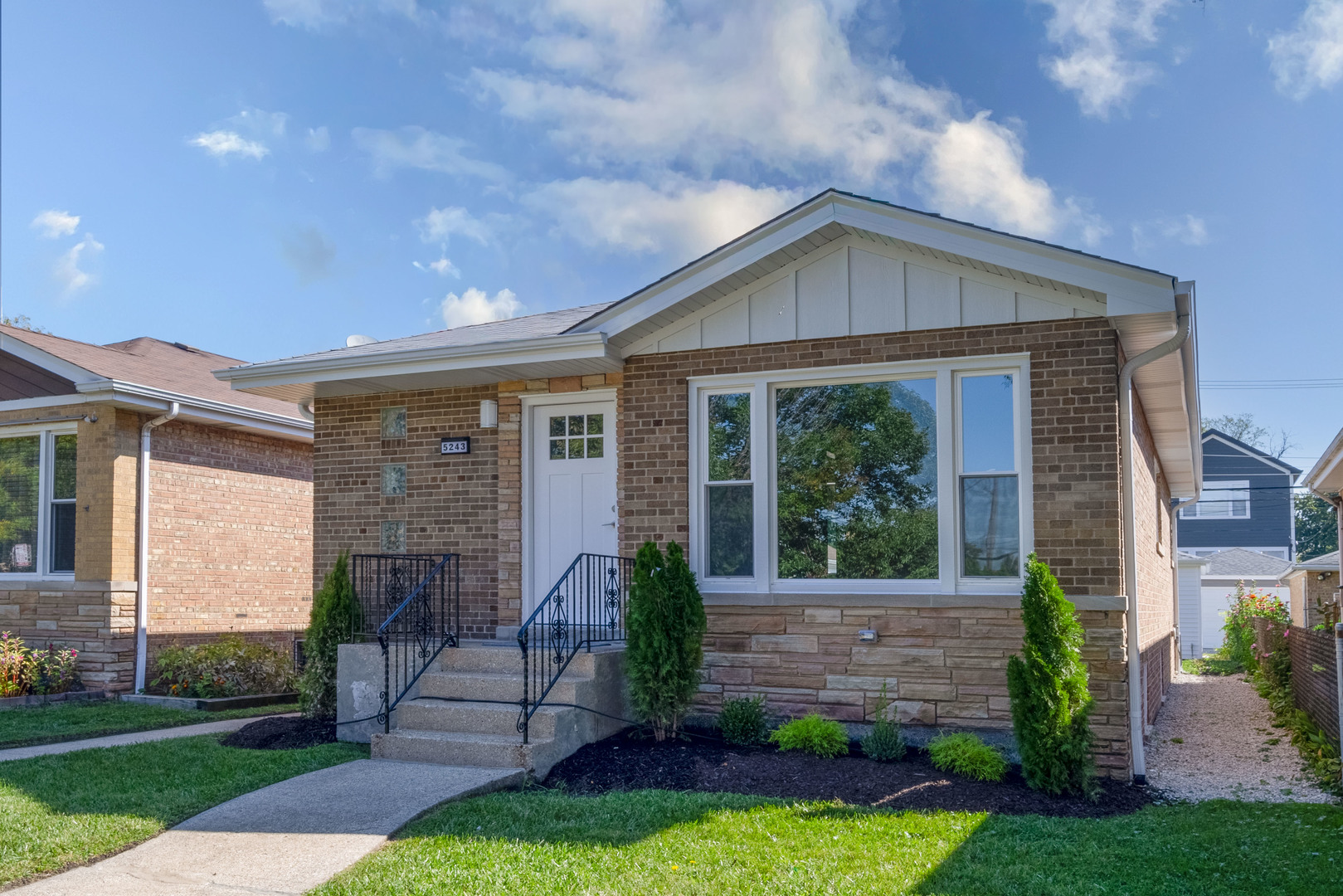 Jefferson Park is a neighborhood located on the Northwest Side of Chicago, Illinois. It is one of the city's 77 community areas and serves as a major transportation hub, often referred to as the "Gateway to Chicago." This beautifully updated ranch-style home features four spacious bedrooms, including three on the main level and an oversized bedroom in the fully finished lower level. Both full bathrooms have been completely renovated with new tile, quartz countertops, and modern cabinetry. The stunning kitchen is a highlight of the home, showcasing quartz counters, a matching backsplash, and a dramatic waterfall peninsula that seamlessly connects to the open main living area. Gleaming hardwood floors extend throughout the main level, enhanced by new oak stairs that lead to the finished basement. The basement features luxury vinyl plank flooring, recessed lighting, an electric fireplace, and a wet bar complete with a beverage cooler. Additional upgrades include ceiling fans in every bedroom, fresh paint throughout, new interior hardware and lighting, new exterior doors, Climate Guard windows, and new gutters, soffits, and fascia, along with attic insulation. The home is equipped with a brand-new HVAC system for heating and air conditioning, a new water heater, and all-new appliances, including a washer and dryer, ensuring complete peace of mind. Outside, you can enjoy a newly constructed back deck and a fully updated garage that features a new roof, siding, windows, gutters, and an automatic door opener. This is definitely a turnkey home just waiting for you and your family. Close to schools shopping and expressway.