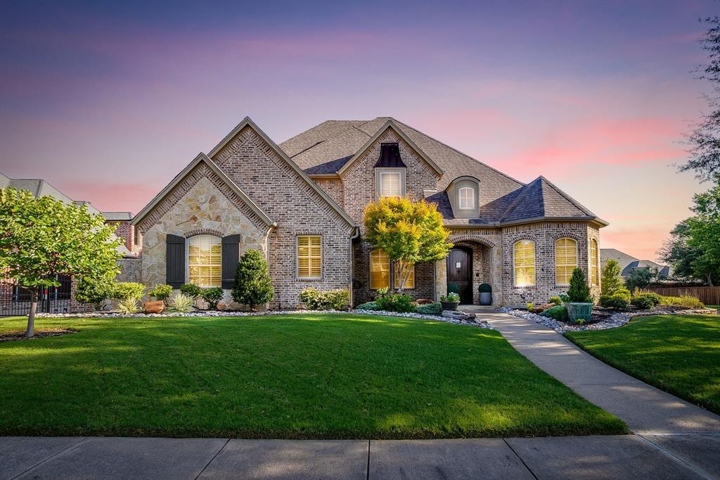 Stunning Keller home situated on a beautifully landscaped corner cul de sac lot, offering exceptional craftsmandship, thoughtful design, and incredible indoor-outdoor living.  With 4,483 square feet, this impressive 5 bedroom , 4 bath home features hand scraped hard wood floors, soaring ceilings, elegant lighting, and multiple living and entertaining spaces throughout.  The beautifully appointed kitchen is designed to impress with high end Wolf appliances, a Sub-Zero refrigerator, steam oven, beautiful countertops, custom cabinetry and a large island over looking the inviting living area with a striking stone fireplace.  The private primary suite offers a relaxing retreat with a sitting area, spa like bath, generous walk in closets and custom built ins.  Three additional guest bedrooms with private baths provide plenty of space and privacy while the upstairs game room creates another wonderful area for entertaining and relaxing.  Step outside to your own private backyard oasis.  Featuring a covered patio with stone fireplace, peaceful fountain, pergola-covered garden area.  Mature trees and lush landscaping and a fully fenced in yard create a serene setting to enjoy quiet evenings at home.  This home is timless and and pride of ownership is evident from head to toe.  This is a must see!