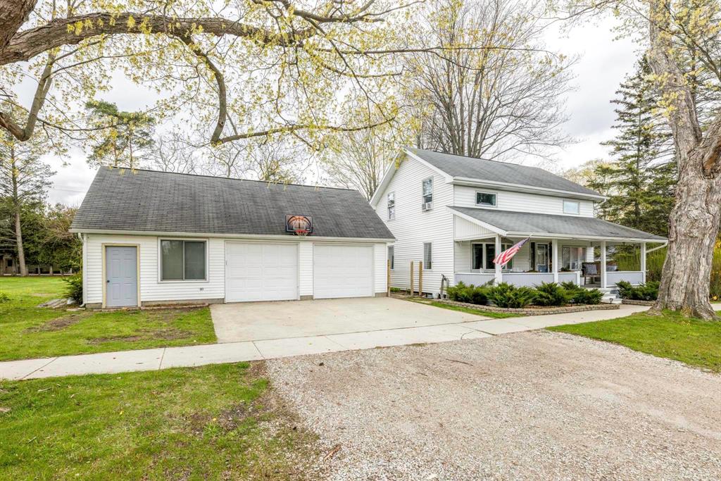 Welcome to 5522 Union Street in the Village of Lexington! Your Next Home boasts a beautiful Covered Front Porch, 4 Bedrooms, 2 Baths, 2750 Sq Ft plus an unfinished basement for additional storage! Prime location - Walking distance to Meyer Elementary, the quaint shops & restaurants in the Village & the iconic Harbor/Marina! Large Rooms sizes including main floor Living, Dining & Kitchen! The Rear Addition boasts an upper Family Room behind a hidden staircase! Two Main Floor Bedrooms - one has an 8'x9' Sitting Room currently used as a large Closet/Office Area. The Upper Level of the Main portion of the Home boasts the Primary Bedroom with Bath, the 4th Bedroom, & an Office! The Home needs updated floor coverings but priced accordingly! Unfinished Michigan-style Basement (1,165 Sq Ft) under the main original portion of the Home provides lots of storage! Side Patio Area between the House & Detached Garage! The 36'x24' Garage has 2 Front & 1 Rear Garage Doors - plus a 'Man-Cave' &/or 'She-Shed' section for the Hobbyist! Experience life in the Village of Lexington!