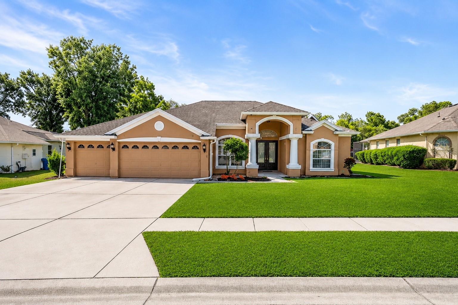 One or more photo(s) has been virtually staged. Welcome to Pristine Place, one of Spring Hill's most desirable gated communities, where comfort, privacy, and the true Florida lifestyle come together. From the moment you arrive, a sense of tranquility is palpable: quiet streets, well-maintained homes, and a secure environment that's hard to find elsewhere. Stepping through the elegant double glass doors, you'll find a light-filled interior with an open layout that feels welcoming from the first moment. Decorative molding details and spacious rooms create a warm yet elegant ambiance.The kitchen is at the heart of the home, featuring granite countertops, ample cabinetry, and a welcoming breakfast nook—perfect for starting the day calmly. It flows seamlessly into the main living area, ideal for entertaining and socializing. The family room, with its inviting fireplace, offers views of the pool, creating that indoor-outdoor connection that buyers are looking for.The master suite is designed for comfort and privacy, with direct access to the pool, a spacious walk-in closet, and a spa-like bathroom with double vanities, a garden tub, and a separate shower. The split-floor design provides added flexibility, including a private bedroom and en-suite bathroom with a pocket door, ideal for guests, family, or as a workspace.Stepping outside, the property truly shines. The screened pool, infinity spa, and lanai create a private retreat perfect for relaxing, entertaining, or enjoying the Florida lifestyle year-round. The pool's safety system adds extra peace of mind.This property inspires confidence thanks to significant improvements already made:• Completely new roof recently installed• Durastar 5-ton air conditioning system with only 1 year of use• Whole house water softener and additional system in the kitchen• Security system for doors and windowsPristine Place is a gated, regulated community, renowned for its meticulous maintenance and low HOA fees. Residents enjoy a clubhouse, community pool, fitness center, and walkable streets, making it one of the most stable and desirable areas in Spring Hill.The location is another great benefit:• Approximately 5–10 minutes from shops, supermarkets and restaurants• Close to hospitals and medical services• Quick access to Suncoast Parkway for easy travel to Tampa and Clearwater• About 10–15 minutes from Weeki Wachee Springs, ideal for kayaking and nature• Approximately 20–25 minutes from Pine Island Beach, with access to the GulfThis property offers more than just features; it offers a lifestyle experience: security, comfort, and convenience in a prime location. Homes in gated communities with these amenities and lifestyle tend to stand out quickly. Don't miss out on the opportunity to schedule your exclusive tour and uncover all the amazing features of this home. Home has video / audio  cameras inside home.