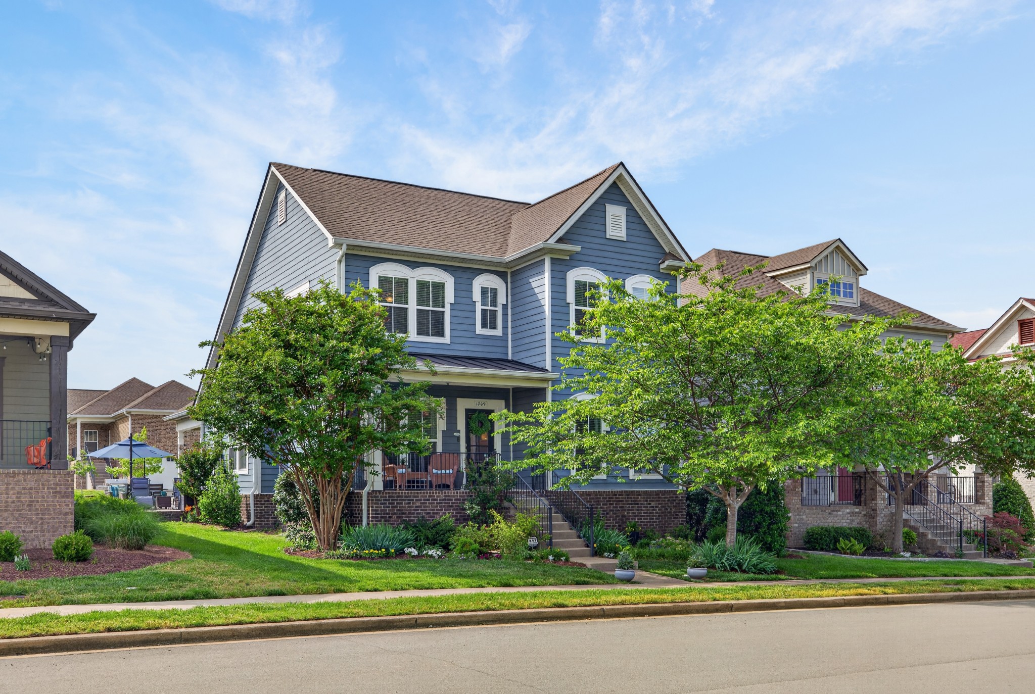 Live across from the dog park and community garden in one of Carothers Farm’s most walkable spots! Built by Regent Homes, this charming house pairs classic neighborhood architecture with an easy, efficient floor plan designed for everyday comfort. A covered front porch faces southeast for soft morning light, while the covered back porch and patio face northwest—perfect for relaxed evenings, grilling, and winding down at the end of the day.Inside, the main level lives beautifully with hardwood flooring, two carpeted bedrooms, two full baths, laundry, a comfortable living room, and a bright kitchen with eat-in dining. The main-level primary suite is privately positioned at the rear of the home, while the second main-level bedroom sits toward the front—ideal for guests, a home office, or flexible one-level living. The kitchen includes smart upgrades buyers appreciate, including a single-bowl sink and gas stove.Upstairs adds the kind of space that makes this home feel larger than expected: a bonus room, two additional bedrooms with large closets, an 11x8 heated and cooled storage room, plus walk-in attic storage. Whether you need room for kids, guests, hobbies, media, or work-from-home space, this layout delivers options without wasted square footage.The location inside Carothers Farm is the standout. Enjoy sidewalk strolls to the playground, dog park, community garden, walking trails, event barn, and neighborhood shops just around the corner. Carothers Farm is known for its timeless streetscapes, front-porch lifestyle, open space, and community feel, with Cane Ridge Park next door for bike trails, disc golf, ball fields, tennis courts, and more. You’re also minutes from Nolensville Rd, Concord Rd, I-24, everyday grocery options, local dining, historic Nolensville, Tanger Outlets, Brentwood, Cool Springs, BNA, and downtown Nashville. A comfortable home, connected neighborhood, and location that makes daily life easier—this one checks the boxes.