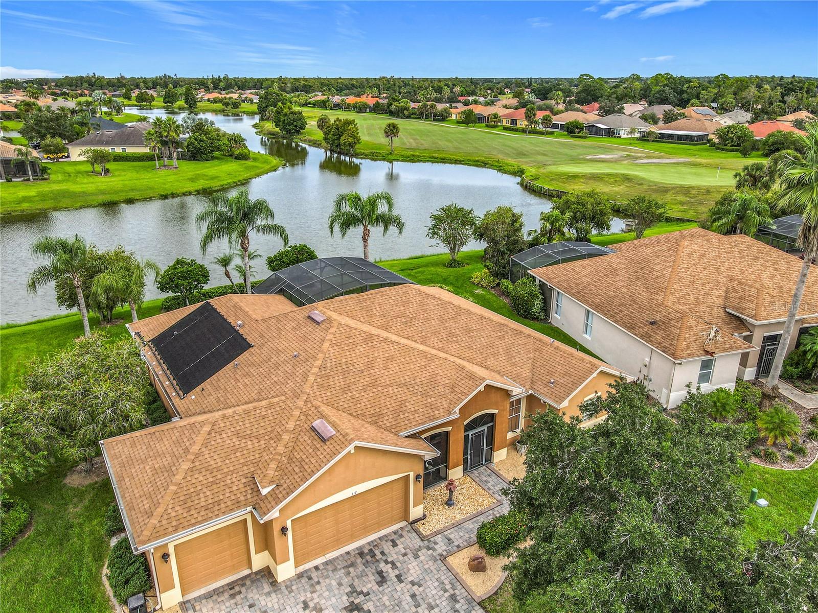 Under contract-accepting backup offers. Financing fell through! Your opportunity to buy this ABSOLUTELY STUNNING Operetta model with a SALT WATER POOL on a  POND with $$ MILLION $$ WATER & GOLF COURSE views in the Bella Viana subdivision of Solivita. THREE CAR GARAGE! HVAC new 2019. Roof new 2016. 50 gallon Water Heater NEW 2016. Great Curb appeal with Landscape Curbing surrounding the front flower beds. Stones w/ some fresh plantings in the flower beds. Front entryway is screened. 8' doors, 5.5" BASEBOARDS, ROUNDED CORNERS, DOUBLE PANE WINDOWS & SLIDERS throughout. Extensive CROWN MOLDING. Custom CLOSET ORGANIZERS in bedrooms. 20" CERAMIC TILE ON THE DIAGONAL in all main living areas with LAMINATE in bedrooms (NO CARPET). Kitchen features QUARTZ counters, 42" upper cabinets with Crown Molding, several GLASS WINDOWS & a WINE RACK, pull-out drawers in lower cabinets, a moveable ISLAND w/ GRANITE counter, 2 SKYLIGHTS, STAINLESS STEEL APPLIANCES including a SLIDE-IN RANGE, pantry w/ custom doors matching the cabinetry & pull-out drawers and RECESSED & UNDER CABINET lights. BREAKFAST BAR. FLORIDA ROOM has excellent views of WATER. Primary Bedroom has 2 WALK IN CLOSETS. The bathroom boasts DUAL sinks, QUARTZ counters, LARGE WALK-IN *ACCESSIBLE* SHOWER & Glass Block windows. Second Bathroom has QUARTZ counter and a tub w/ shower. Powder Room has Corian counters. LARGE *Custom*  LAUNDRY ROOM has Corian Counters, a wash basin & built-in cabinets. Shown Washer & Dryer do not convey but will be replaced w/ another W/D. Garage includes two overhead storage racks & is PLUMBED for WATER SOFTENER. Garage floor is painted with Epoxy & Confetti Chips. Outdoor living to it's finest with HUGE LANAI & POOL deck which is EXTENDED & SCREENED. LARGE 13' X 25" Pool has a SALT System, is SELF CLEANING & heated by SOLAR PANELS. Exclusions include drapes in Florida Room & Primary Bedroom. **See the FULL LENGTH VIDEO on Tour Link 1.** ***Solivita is an active adult 55+ community located in Kissimmee, Florida. It is approximately 50 minutes from Disney World & the Orlando International Airport. Solivita has a total of 5,470 homes. Approximately 10,000 - 11,000 people live in Solivita during the winter while approximately 7,500 live in Solivita during the summer. Enjoy your active years in this piece of paradise. Solivita's amenities include: - a manicured SOFTBALL diamond & field - 36 holes of CHAMPIONSHIP GOLF that can be played by joining the Stonegate Golf Club or paying as you go - 2 STATE of the Art AMENITY centers with updated exercise equipment, yoga studio & meeting rooms - 3 restaurants - 14 HEATED POOLS - 17 PICKLEBALL courts - 9 TENNIS courts - 4 BOCCE BALL courts - 4 SHUFFLEBOARD courts - 3 HORSESHOE pits - a BILLIARDS room - miles of bike paths - 2 DOG PARKS (Small & Large Dogs) - Corn Hole - Tot Lot PLAYGROUND - COMMUNITY GARDEN - over 250 resident clubs. The HOA: - maintains the LANDSCAPING & IRRIGATION systems in the common areas as well as at individual homesites - maintains the roads throughout the community - PROVIDES SECURITY with gate guards - allows AUTOMATED GATE ACCESS for residents via license plate readers - provides residents with Fiber Optic Internet & TV service.***Poinciana Lakes Plaza is a MAJOR NEW SHOPPING CENTER that opened directly across from the Solivita Main Gate in Summer of 2024. It features Sprouts Grocery, TJ MAXX, Ross, Burlington, Rack Room Shoes, 5 Below, Ulta, Outback, First Watch, 5 Guys, Urgent Care, Dentist, TD Bank, Petco & Hair Cuttery.***