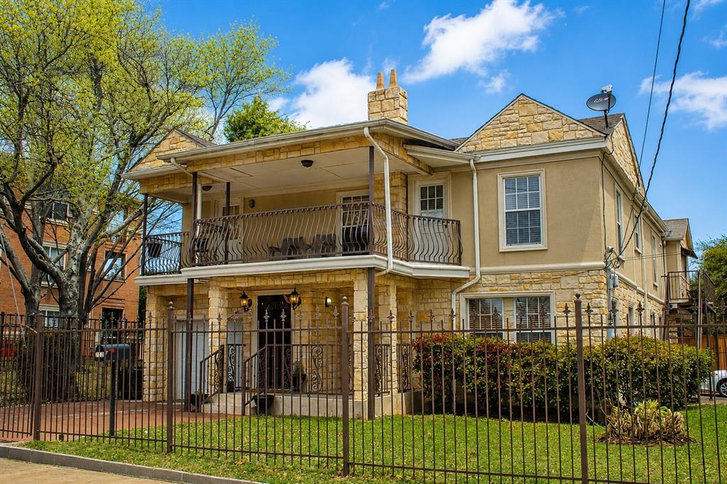BEAUTIFULLY UPDATED 1940s STONE HOME WITH PRIVATE GUEST APARTMENT! Ideally located minutes from Downtown Dallas, Uptown, Lower Greenville, premier shopping, dining, and Klyde Warren Park. Situated on a corner lot across from a neighborhood park, this distinctive property offers 4 spacious bedrooms, 4 full baths, PLUS a detached guest apartment above the garage featuring a private bedroom, full bath, kitchen, and living area—perfect for guests, extended family, or additional living flexibility. The main residence features a grand entry with wrought-iron staircase, custom wood cabinetry, granite countertops, and a six-burner gas range. The expansive primary suite offers a private balcony, walk-in closets, and a spa-inspired bath with dual steam showers and a jetted tub. Enjoy downtown skyline views, a spacious backyard, 3 garage spaces, two automatic security gates, secured RV parking, and NO HOA! A rare combination of classic charm, modern amenities, and urban convenience.