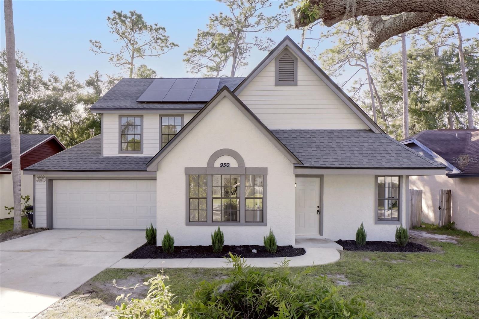 Welcome to 950 Woodrose Court in Altamonte Springs - this is an ideal home for those seeking an updated living space. This renovated home has 4 bedrooms with 2 bathrooms. The renovations include new kitchen cabinets, kitchen appliances and Quartz countertops, fully renovated luxurious bathrooms, new flooring, new lighting, new ceiling fans and more. NEW Roof in 2023, New termite bond in 2026, AC in 2022 and Water Heater in 2024! Country Creek offers a low HOA and wonderful amenities including a community pool, clubhouse, tennis/racquetball courts, basketball courts, and playgrounds. Altamonte Springs offers nearby Lake Lotus Park and an abundance of shopping & dining options. And, Country Creek is minutes from Downtown Orlando, Maitland Center, and the Lake Mary business corridor — this home blends work, life, and recreation in a beautiful natural setting.