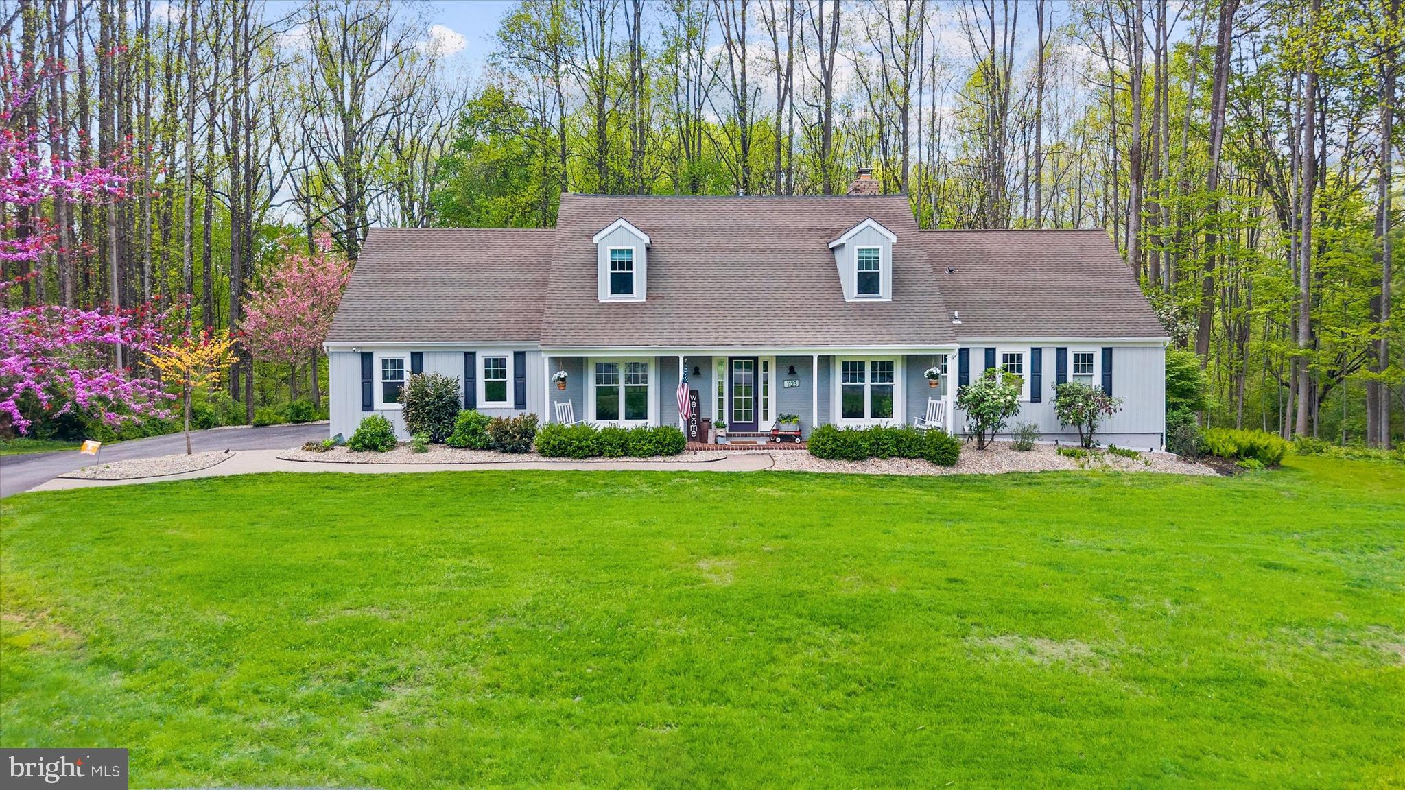 Welcome to this reimagined Cape in desirable Radley Run, offering over 4,000 square feet of thoughtfully designed living space on a private one-acre cul-de-sac lot. This 4-bedroom home with a bonus room, 3 full baths, and 2 powder rooms blends timeless character with extensive, high-quality updates throughout.Inside, hardwood floors extend through much of the home, while two gas fireplaces add warmth and ambiance. The first-floor primary suite offers both convenience and privacy, complete with a sitting room, a fully renovated spa-like bath, a walk-in closet, and a private veranda perfect for enjoying your morning coffee.The expansive chef’s kitchen has been opened to create seamless flow into the sun-filled family room, forming the true heart of the home and an ideal space for everyday living and entertaining. Featuring a large island and breakfast area, the space connects effortlessly to the expansive Trex deck spanning the length of the home perfect for taking in the surrounding natural setting. A well-designed mudroom with custom lockers, a vintage laundry sink, and a powder room adds both style and functionality.The first floor also offers two additional flexible living spaces, ideal for a home office, sitting room, or playroom, along with a second powder room conveniently located off the family room.Upstairs, the home has been significantly expanded to include additional bedrooms, beautifully updated full baths, and a spacious sitting area. A flexible bonus room offers endless possibilities perfect for a guest suite, office, or additional lounge. A dedicated second HVAC zone ensures comfort on every level.The finished lower level adds approximately 1,000 square feet of additional living space, ideal for recreation, fitness, or entertaining, along with major system upgrades including a new HVAC system, updated electrical panels, water softener, and reverse osmosis system.Outside, the property has been extensively upgraded with new siding, windows, garage doors, driveway, walkway, and professional landscaping enhanced by landscape lighting and mature tree removal creating a truly move-in ready home.Located in the highly sought-after Unionville-Chadds Ford School District and just a golf cart ride to Radley Run Country Club, members can enjoy access to golf, a pool, tennis, paddle courts, and a full-service clubhouse.Set in one of Chester County’s most desirable communities and just minutes from shopping, dining, and everyday conveniences, this home offers a rare combination of privacy, space, and lifestyle, truly a one-of-a-kind offering in Radley Run.