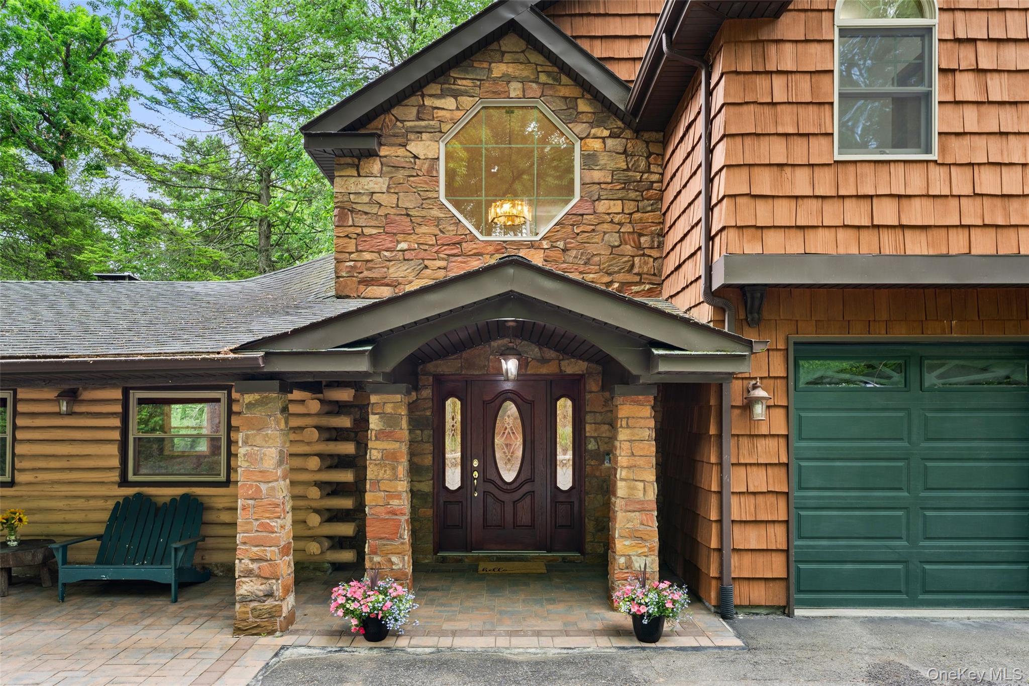 Escape to your own private retreat on 3.44 acres of wooded land, where rustic charm meets modern comfort. This unique residence was thoughtfully expanded in 2005 and refined with modern luxuries while preserving its timeless character. The beautifully crafted, freshly painted 2,708-square-foot home offers 3 bedrooms and 4 bathrooms in a serene, nature-filled setting.Inside, you'll find a thoughtfully designed open-concept layout featuring a modern kitchen that flows seamlessly into a stunning log cabin-style living room. In addition, a sun-filled family room provides exceptional flexibility and can easily serve as a fourth bedroom, home office, or guest suite. The first-floor bedroom adds convenience and accessibility for family members and visitors alike.Step outside and discover an extraordinary outdoor lifestyle. Explore your own private forest hiking trails and designated picnic area, enjoy the playground, relax on the inviting front porch, or entertain guests on the expansive stone patio. The property also features a stone-rimmed natural pool, a charming gazebo, and a unique stone pizza oven—perfect for outdoor gatherings, dining, and creating lasting memories.Offering the rare combination of privacy and convenience, this peaceful sanctuary is just minutes from shopping, restaurants, and schools. Located only 35 miles from New York City, it provides the perfect balance of tranquil country living and easy access to world-class amenities.Whether you're searching for a forever home, a weekend getaway, or a vacation retreat, this one-of-a-kind property offers an exceptional lifestyle in a truly picturesque setting.