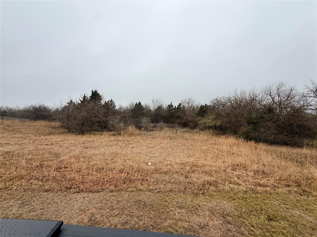 Rare opportunity to own over 2 acres across two adjoining lots being sold together in a prime Moore location! This beautiful property offers the perfect blend of privacy and convenience, with mature trees throughout and a scenic creek running along the back of the property, creating a peaceful natural setting.With no known restrictions, you have the flexibility you’ve been dreaming about. Whether you’re looking to build now or invest for the future, this property provides plenty of space and possibilities. Just minutes from shopping, restaurants, schools, and quick highway access in Moore and the surrounding Oklahoma City metro.Properties with this much land, natural beauty, and location flexibility rarely come available, don’t miss your chance to make it yours!