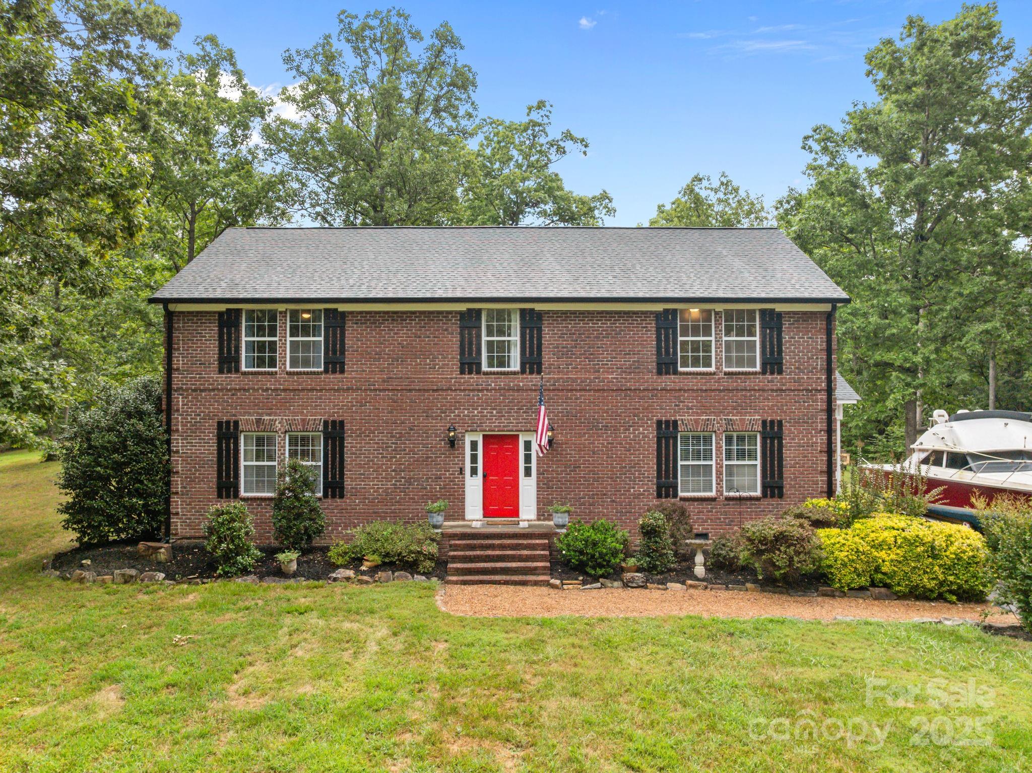 This beautifully renovated home is a private, secluded oasis! This stunning full-brick colonial, is nestled on just shy of 10 acres & offers the peace, tranquility, and privacy of country living you've been dreaming of! The downstairs features a living room, large custom kitchen, grand foyer, formal dining room, and a spacious bedroom that could serve as a primary suite or inlaw suite, a full bathroom, and laundry room. New LVP flooring throughout, gorgeous custom herringbone tile in the laundry room. Upstairs the spacious primary suite boasts a newly renovated custom bathroom, two additional bedrooms, full bath, office, and a huge walk-in closet. The property also includes a barn, carport, and a large shed. Recent upgrades feature a new roof and gutters installed within the last five years, two new HVAC units within the last three years, and a newly installed water heater, among many other enhancements. This exceptional property won't last long, schedule your showing soon!