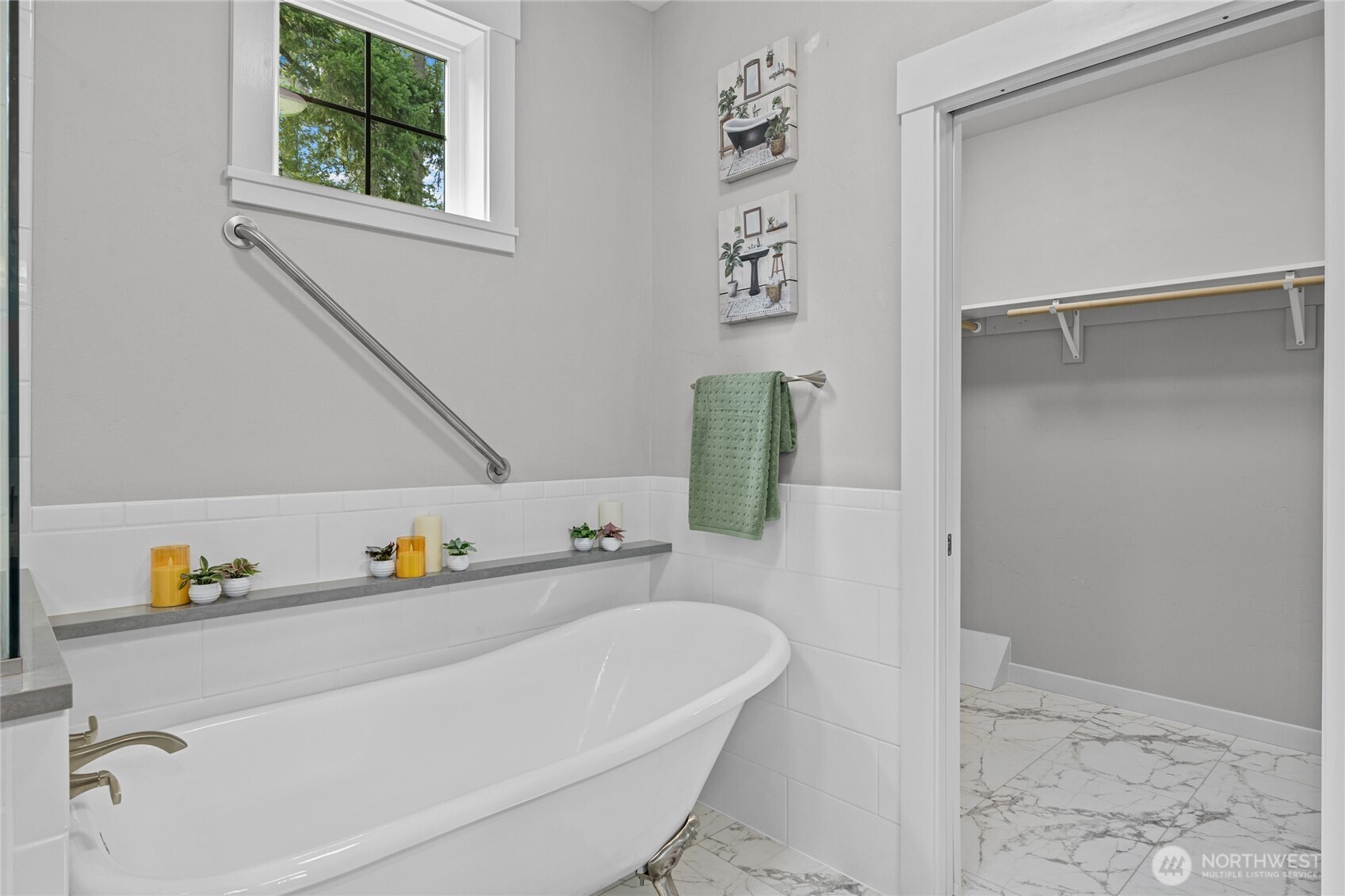 Relaxing claw foot bath tub in your primary suite
