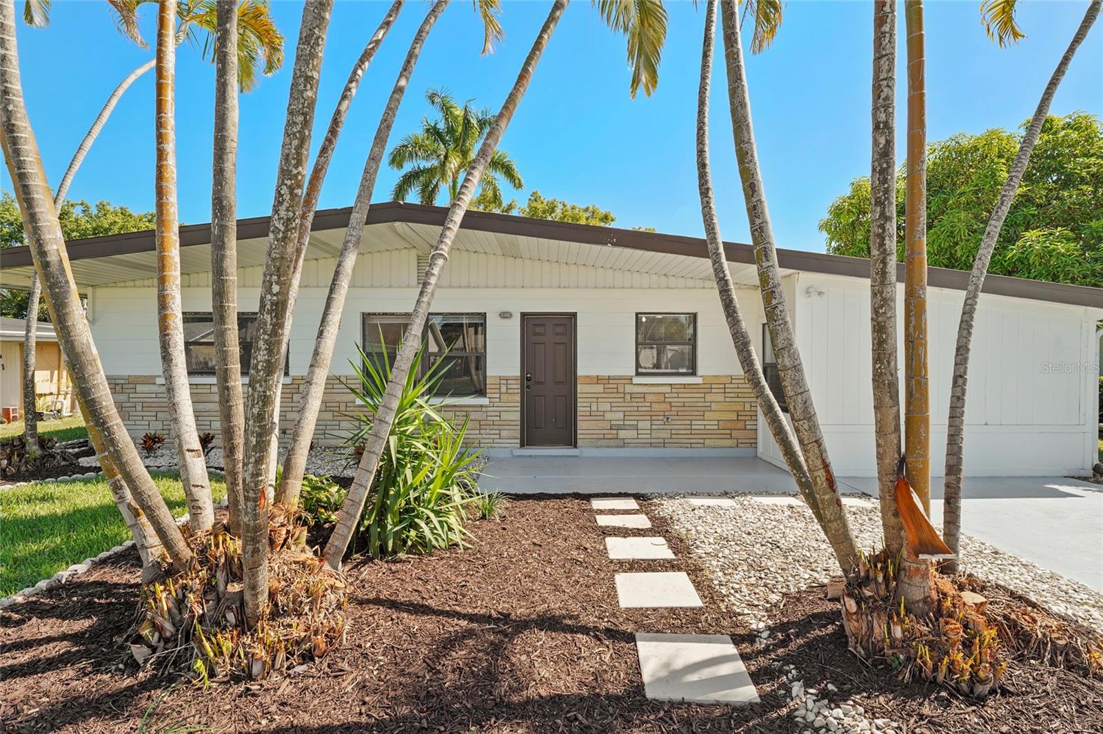 Welcome to 5619 New York Avenue, a charming Sarasota retreat where comfort, style, and convenience come together beautifully. Nestled in a quiet neighborhood with no HOA, this home offers the freedom to truly make it your own while being just minutes from Siesta Key Beach, Downtown Sarasota, and all the coastal lifestyle has to offer.

As you arrive, refreshed tropical landscaping and a welcoming curb appeal set the tone. Step inside to find a bright, open layout designed for easy living and connection. Natural light fills every corner, reflecting off tile floors that create a clean and calming atmosphere. The kitchen opens to the living space, perfect for entertaining or relaxed family gatherings, while large sliding doors invite you to step outside and experience the home’s centerpiece, your private backyard oasis.

Out back, the sparkling pool is surrounded by lush greenery, offering a peaceful escape where you can unwind, host weekend barbecues, or simply soak up the Florida sun. The fenced yard provides privacy and room for pets or gardening, creating a perfect blend of relaxation and functionality.

Whether you are looking for a full time residence, a seasonal getaway, or an investment opportunity, this home captures what makes Sarasota living so desirable. You are close to the area’s top beaches, shopping, dining, and cultural attractions, yet tucked away in a neighborhood that feels like your own personal retreat.

This is your chance to own a pool home in Sarasota that combines character, comfort, and location while giving you the freedom of no HOA restrictions. Experience the lifestyle you have been dreaming of at 5619 New York Avenue.