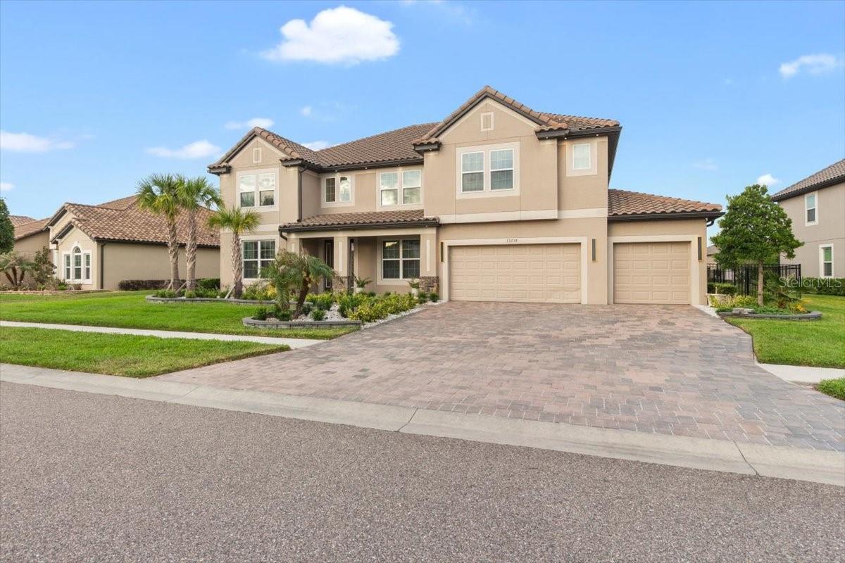 Luxury living at its finest in the heart of Wesley Chapel! This breathtaking 7-bedroom, 5-bathroom two-story estate with a private office is the definition of elegance, sophistication, and modern Florida luxury living. From the moment you walk through the doors, you are welcomed by soaring high ceilings, grand open spaces, and stunning designer details that create an unforgettable first impression.Completely move-in ready and loaded with high-end upgrades, this exceptional home features custom-made closets, modern built-in entertainment walls, smart toilets, a gourmet chef’s kitchen with breathtaking countertops, an oversized laundry room with dedicated ironing area, and a spacious 3-car garage with additional storage. Every detail has been carefully designed to offer comfort, functionality, and true luxury.Step outside to your private resort-style oasis featuring a spectacular oversized pool and serene lake views—the perfect setting to relax, entertain, and enjoy the ultimate Florida lifestyle year-round.Ideally located just minutes from top-rated restaurants, premier shopping, entertainment, and the famous Epperson Lagoon, this home is also zoned for some of the best elementary, middle, and high schools in the area, making it the perfect combination of luxury and convenience.This is not just a house—it’s the home of your dreams. A rare opportunity to experience luxury, comfort, style, and exclusivity all in one extraordinary property, with absolutely nothing left to do except move in and enjoy. Don’t miss the opportunity to own this incredible home—come experience it in person and fall in love. Schedule your private tour today and discover why this is one of the most exceptional buying opportunities in Wesley Chapel.