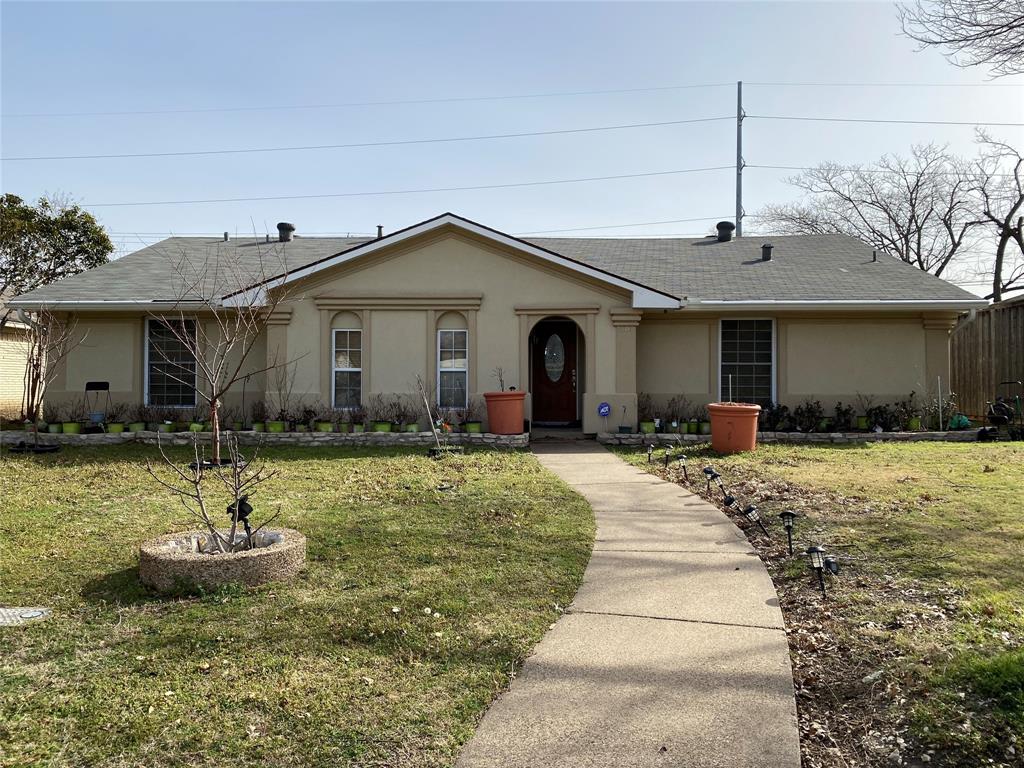 Prepare to be DAZZLED!   You have to see to believe how Drop-Dead Gorgeous this Luxurious Four bedroom, 2 and a half bath home is.  No expense was spared when totally updating and remodeling.  The exterior of the home is upgraded to stucco, and may insulate the home more.  When roof was replaced, extra whirlybirds were added for additional ventilation.  A huge solar panel system was added, to reduce electric costs. The Solar panels are paid off and offer FREE ELECTRICITY  New HVAC system, new windows, new gas stove with double ovens, new dishwasher.  Hardwood, Granite and Marble throughout.  In addition, custom wood blinds and a camera security system.  Back yard is ready for a garden and has a new Stone Patio.  Stop your car.  This is your next HOME!  MUST SEE!!