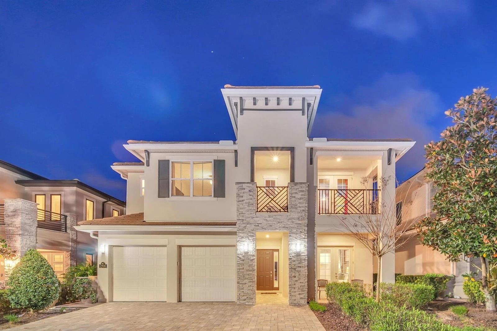 Experience the pinnacle of resort living and high-yield investment potential at 7936 Jacks Club Court, a stunning 6-bedroom, 6.5-bathroom masterpiece located within the prestigious Bear’s Den enclave at Reunion Resort. Meticulously designed to sleep 14 guests, this fully furnished villa serves as the ultimate "home away from home" where a chef’s kitchen anchors the heart of the residence, boasting a massive combined dining capacity for 20 that flows seamlessly into a living area built for movie-theater style relaxation. A rare find in vacation rentals, the first floor features two secluded master suites, perfect for guests seeking accessibility and privacy without stairs. The entertainment value is unmatched, featuring a Tetris-themed garage-turned-arcade equipped with Air Hockey and Batman racing games to drive repeat bookings, while a second-floor loft offers a VIP retreat complete with Billiards, Shuffleboard, and a sleek wet bar. Step outside to your private Florida oasis where a spectacular pool with a spillover spa and ledge loungers awaits, complemented by a stainless steel summer kitchen perfect for al-fresco dining against a backdrop of serene golf course views. Upstairs, the luxury continues with three additional primary bedrooms featuring private balconies and a custom-built "Magical Village" bunk room that offers a unique experience for younger guests. Ideally situated just minutes from Orlando’s world-class theme parks, dining, and shopping, this property grants access to Reunion Resort’s elite amenities, including three signature golf courses, a multi-acre water park, tennis courts, and fitness centers. Whether you are seeking a premier vacation retreat or a powerhouse addition to your investment portfolio, this turnkey villa delivers luxury and performance at every turn.