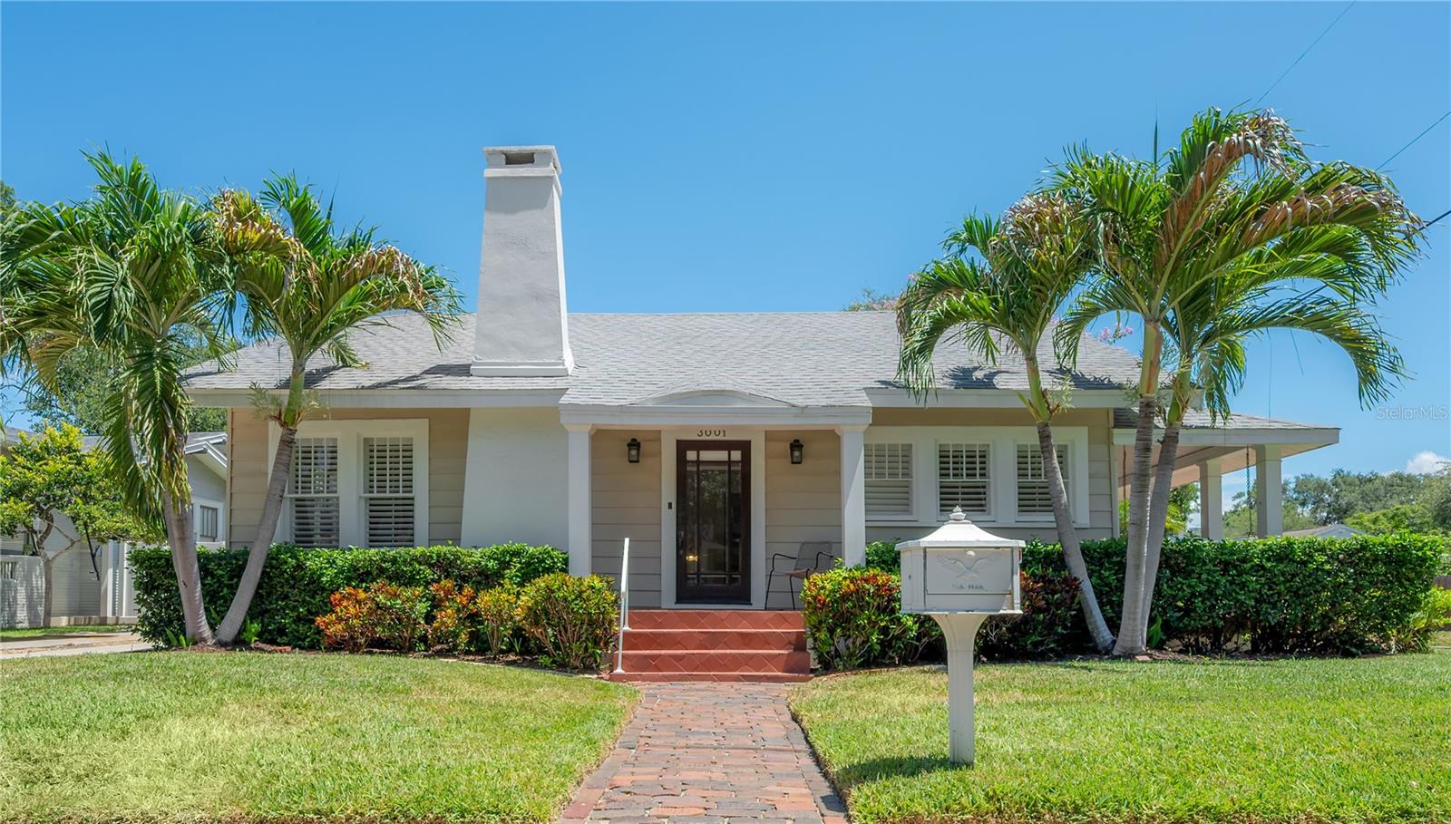 You will be amazed by everything this home has to offer! A rare package since you have it all in this 3/3 entirely renovated and thoughtfully designed bungalow complete with 2 main entries, three common living areas, a fireplace, a saltwater pool and heated spa, a one-car garage, a 4-car driveway (motorized gated for 2 car-spaces). Situated on a desirable corner lot in the highly sought-after Palma Ceia neighborhood, east of MacDill Avenue and just a few blocks from Palma Ceia Park and the scenic Bayshore Boulevard waterfront, this home offers a private oasis in the heart of South Tampa. Add to this a bonus 2021 all new 412-sqft (not included in the advertised 1,782 sqft of the house) upstairs non-standard finished loft with central air, insulated ceiling and walls, engineered wood floors, composed of an open bedroom and living area, plus a large ensuite bathroom allowing for amply storage and closet space. When you step inside this house, you’ll discover an open floor plan that feels spacious and bright with natural light. A generous dining / living room flows seamlessly into the kitchen area, creating the perfect space for everyday living and entertaining. The expansive primary suite features a private sitting area in the back that can also serve as a family room, with a built-in entertainment center and tranquil views of the pool. A third bedroom, complete with its own private entrance, offers exceptional flexibility as a home office, guest suite, or mother-in-law bedroom.Originally built in 1927, this bungalow gem beautifully blends timeless architectural character with the convenience of so many 2021 upgrades and accents, including a remodeled kitchen featuring solid wood cabinetry with custom organizational systems, quartz countertops, solid wood ceiling accents, and top-of-the-line new appliances, renovated bathrooms, a whole-house water softener and filtration top-of-the-line  Kinetico system, aluminum windows (except front of the house to maintain the curb appeal) with plantation shutters and elegant decorative shiplap accents in living room and dinning room, drywood termite tenting and whole house subterranean termite preventative treatment, updated electrical and plumbing in many areas of the home. Additional notable features are: 2024 exterior paint, 2018 HVAC system, 2020 roof with insurance-saving features, gas-powered cooktop stove (exterior downdraft vent), fire place, barbecue, tankless water heater, pool heater, dryer. While you may never want to leave home, you'll enjoy being steps from South Tampa's best restaurants, bars, boutique shopping and Hyde Park Village. Commuting is effortless with the Selmon Expressway entrance just a 3-minute drive away. Experience the perfect combination of historic charm, modern luxury, privacy, and convenience in one of South Tampa's most desirable neighborhoods. Come see it for yourself—you'll be delighted.