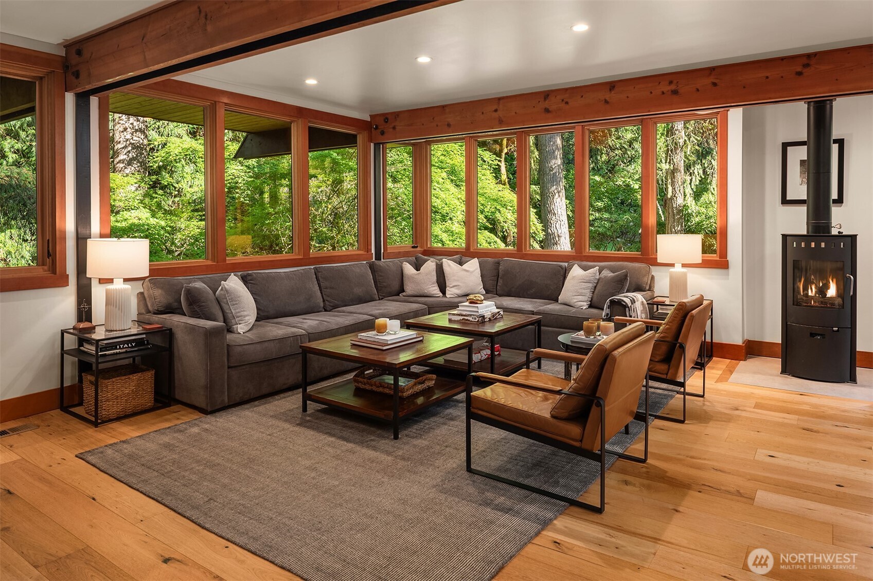 Living room with plush sectional and cozy gas fireplace