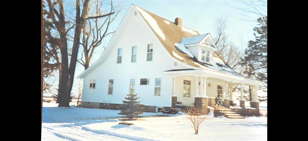 Welcome to your dream country retreat! This charming two-story home sits on 18 acres-9 acres tillable and 7 acres of pasture-surrounded by majestic maple trees and other mature hardwoods. The property provides peace, privacy, and endless opportunities to enjoy the outdoors. Inside, youll find a warm and inviting home filled with unique character, complemented by modern updates such as a newer furnace and an updated septic system. The outbuildings add even more appeal: a spacious hip-roof barn ideal for storage, hobbies, or livestock, plus a detached 32 x 24 two-car garage and stone garage. Whether you envision a hobby farm, a private getaway, or simply more room to roam, this property delivers. With its scenic setting and timeless country charm, this home is truly one-of-a-kind. The 7 acers are current rented out, the owner & renter will be retaining the 2025 crops. There is also a transferable solar payment that is made to the sellers each year.