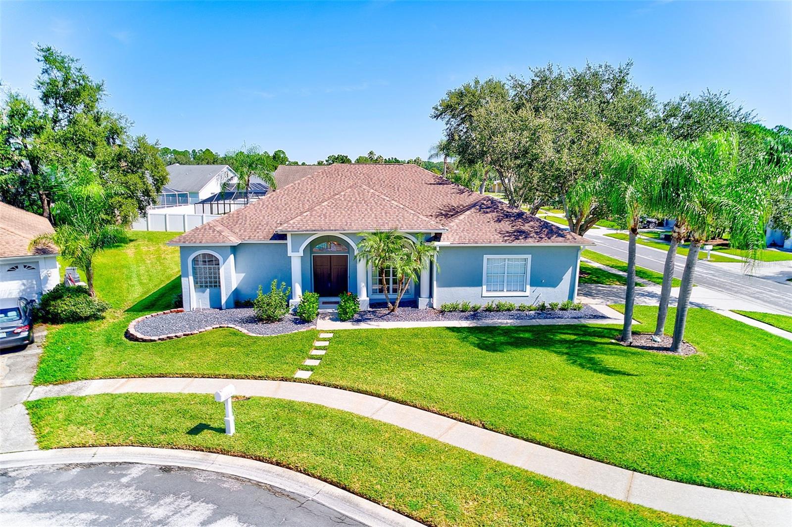 Welcome to this beautifully remodeled 4-bedroom, 3-bath, 2-car garage pool home in Tampa’s sought-after Pebble Creek community. Perfectly positioned on a lush corner lot, this single-story residence showcases a thoughtfully designed split floor plan with formal living and dining areas, along with a spacious family room featuring a cozy woodburning fireplace.



Extensively updated over the past few years, the home blends modern style with comfort. The gorgeous kitchen (2022) offers quartz countertops, plentiful cabinetry, and an expansive pantry area that provides exceptional storage—perfect for everyday living or entertaining. Throughout the home you’ll find luxury vinyl plank flooring, with the bathrooms and wet areas finished in beautiful tile. The primary suite is a true retreat, offering direct pool access, a spa-inspired bathroom with double vanities, a free-standing tub, a separate walk-in shower, and a large custom walk-in closet.



Walls of sliding glass doors in the family room, living room, and primary suite open directly to the lanai, creating seamless indoor-outdoor living. Outside, the pool was resurfaced in 2022, and the screened lanai cage was also rescreened that same year. A large covered area provides the perfect spot for dining, lounging, or entertaining while enjoying the sparkling pool and private backyard oasis. The updated pool/guest bath adds convenience for outdoor living.



Additional updates include a brand-new AC (2025), hot water heater (2024), roof (2018), and a striking double front door that sets the tone for the home’s stylish entry.



Pebble Creek offers wonderful community amenities, including pools, tennis and basketball courts, and playgrounds. All of this, with the convenience of nearby top-rated schools, shopping, dining, and major highways for an easy commute.