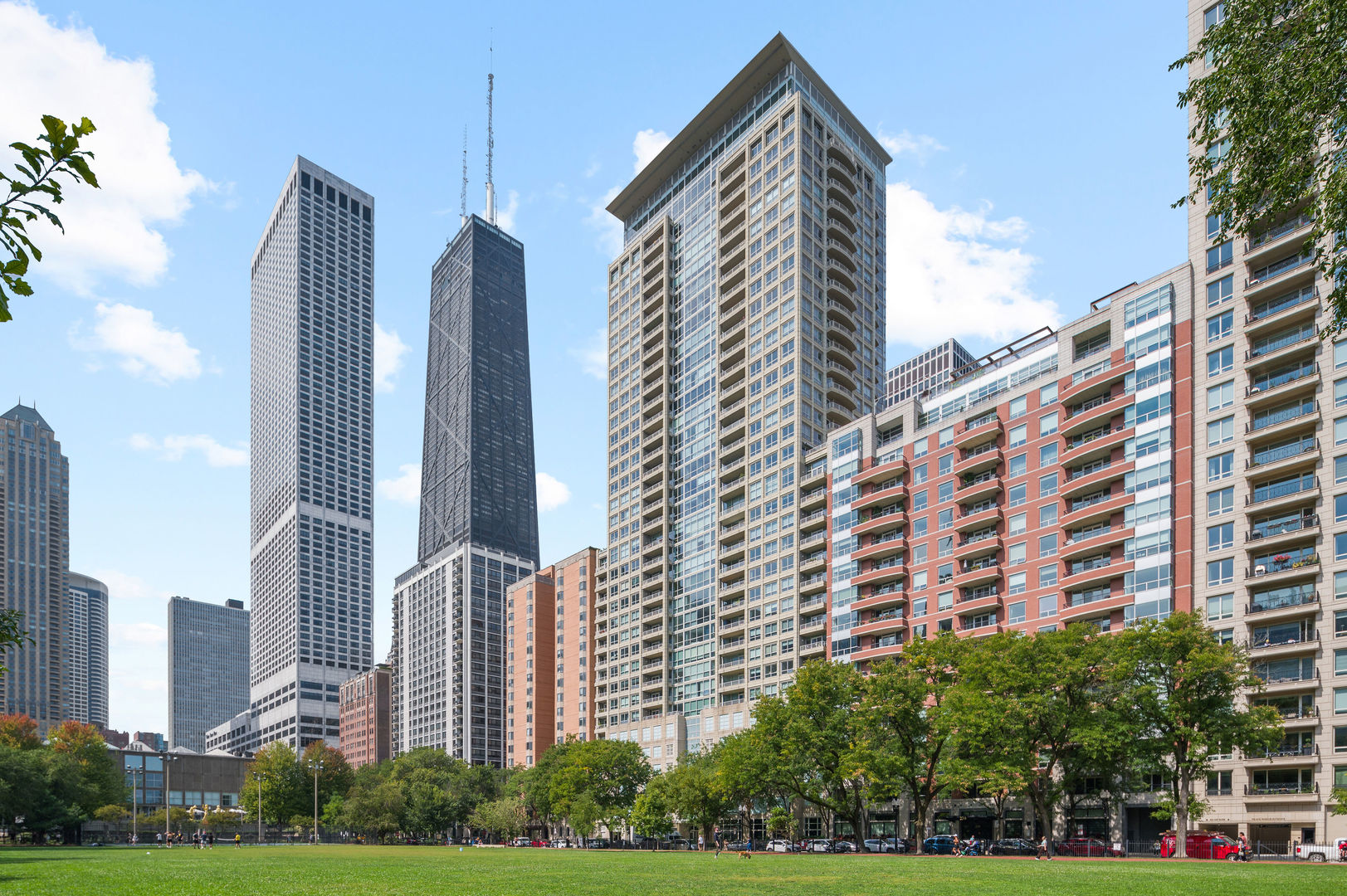 Breathtaking, unobstructed views of Lake Michigan, Navy Pier, and Chicago's skyline set the stage for this impeccable south facing residence. Floor-to-ceiling windows flood the home with natural light, creating a dramatic backdrop of city and water from every view. The smart split-bedroom layout offers privacy and flexibility, while the thoughtfully designed floor plan enhances flow and livability. Recent updates include a modern kitchen equipped with Poggenpohl cabinetry and Miele appliances; every amenity necessary for entertaining family and friends or preparing chef inspired meals at home. The spacious primary suite is complemented by an updated luxurious spa inspired primary bath with sauna and custom walk-in closet.  A large south facing balcony with custom deep planters for lush summer plants offers opportunities to enjoy morning coffee or al fresco dining.   Enjoy the convenience of an in-unit washer and dryer, plus the comfort of stunning vistas in every room. The Pearson is a full-amenity building with 24-hour door staff, a state-of-the-art fitness center, event room, dry cleaner, and a spectacular rooftop deck with beautiful lake and urban vistas. This home blends updated style, convenience, and luxury in one perfect, lifestyle package.  Parking space #31 and storage space G-11 included.