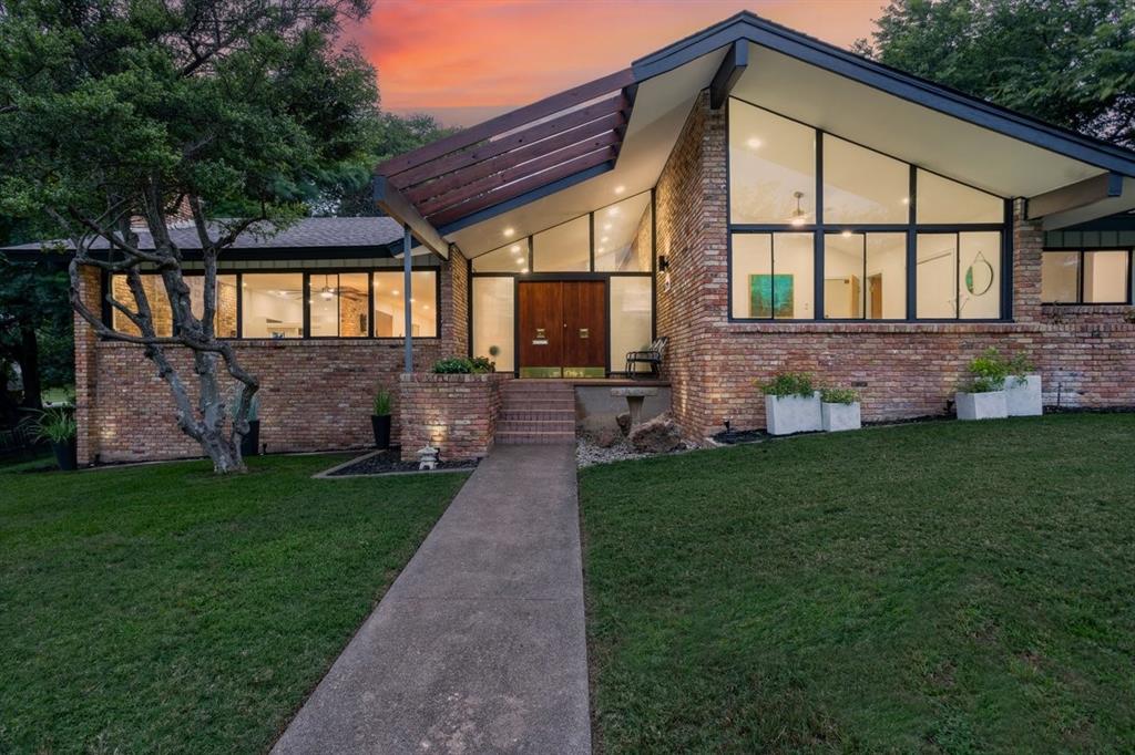 Welcome to a spectacular mid-century modern home in Wynnewood Hills, walking distance to the Golf Club of Dallas, just 15 minutes or less from the  Bishop arts district , Trinity Groves and Downtown. This architectural gem was featured in a 1958 Dallas morning news article written by Jeanne Barnes.  The builder was George Sebastian Sr of Sebastian Construction . The home leverages its enlarged footprint to create a flowing layout defined by striking geometric sightlines, soaring vaulted ceilings, 3 fireplaces, and unforgettable entertaining spaces. Make a grand statement the moment guests arrive in the foyer, which boasts rich brick paving into the den area, a massive floor-to-ceiling brick accent wall, and double mid-century walnut entry doors framed by geometric transom windows and frosted-glass privacy side panels. From there, descend a short flight of brick steps into the heart of the home: the ultimate sunken conversation pit. This main living tier features a dramatic floor-to-ceiling brick fireplace , exposed structural wood beam and Brick flooring . Enjoy the beauty of open-concept living without sacrificing structural character, thanks to iconic architectural dividers like the white accent wall with its stylized oval cutout and integrated wood display shelves, alongside a custom-designed geometric half-wall screen separating the upper landing from the main living tiers.  This residence offers an array of versatile bonus spaces, including dedicated, light-filled sitting nooks  perfect for a music room, home library, gym, or private art studio. These expansive casual areas flow naturally into a open kitchen. Amazing views of the backyard oasis? through a wall of  windows and double French doors, framing tranquil views of a sparkling in-ground pool ,slide and diving board. Properties of this scale and architectural significance rarely come to market. Don't miss this rare opportunity to own a piece of mid-century modern history.