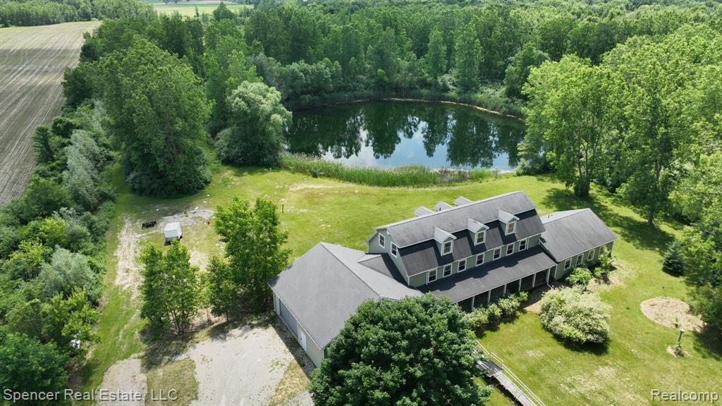 Approximately 6,100 sq. ft. home on 60.5 acres in Armada. Includes 5 bedrooms, 3.5 bathrooms, and three finished levels. Third floor may be used as additional living space.
Main level includes open-concept kitchen, dining, and living area with access to rear deck. Primary bedroom located on the main floor with separate entrance, laundry area, and storage.
Additional features:
Two laundry areas (main and upper levels)
Built-in storage throughout
Large garage
Pond on property
Zoned agricultural
House on 10 acres only available as alternative (See MLS# 20251013273)
All measurements and data are approximate. Buyer and buyer's agent to verify all information.