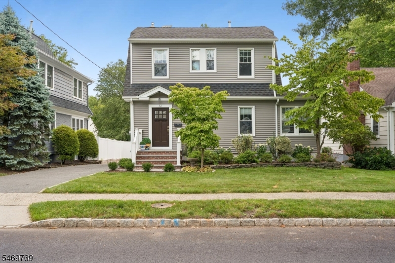 You are invited! Perfect location and a great opportunity to live in Summit! This beautifully maintained Colonial is ideally located in close proximity to schools, park, and restaurants. First floor offers: newer kitchen with white shaker style cabinets, stainless steel appliances, quartz countertops, eating area open to formal dining room. Large living room provides entrance to den/office. Second floor: 3 bedrooms and 1 full bath. Lower level is finished with family room, bath, laundry room and utility area. Outside find a patio for outdoor dining, a level yard with beautiful landscaping and a 2 car garage. Top notch schools, easy access to major highways, airports and prestigious "Short Hills Mall". A MUST VISIT